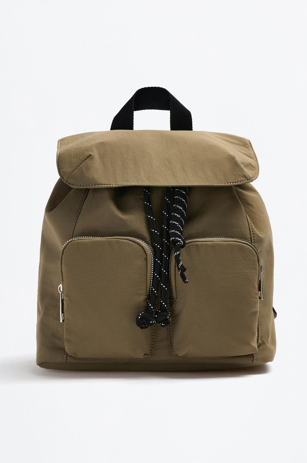 Mochila trench con charm