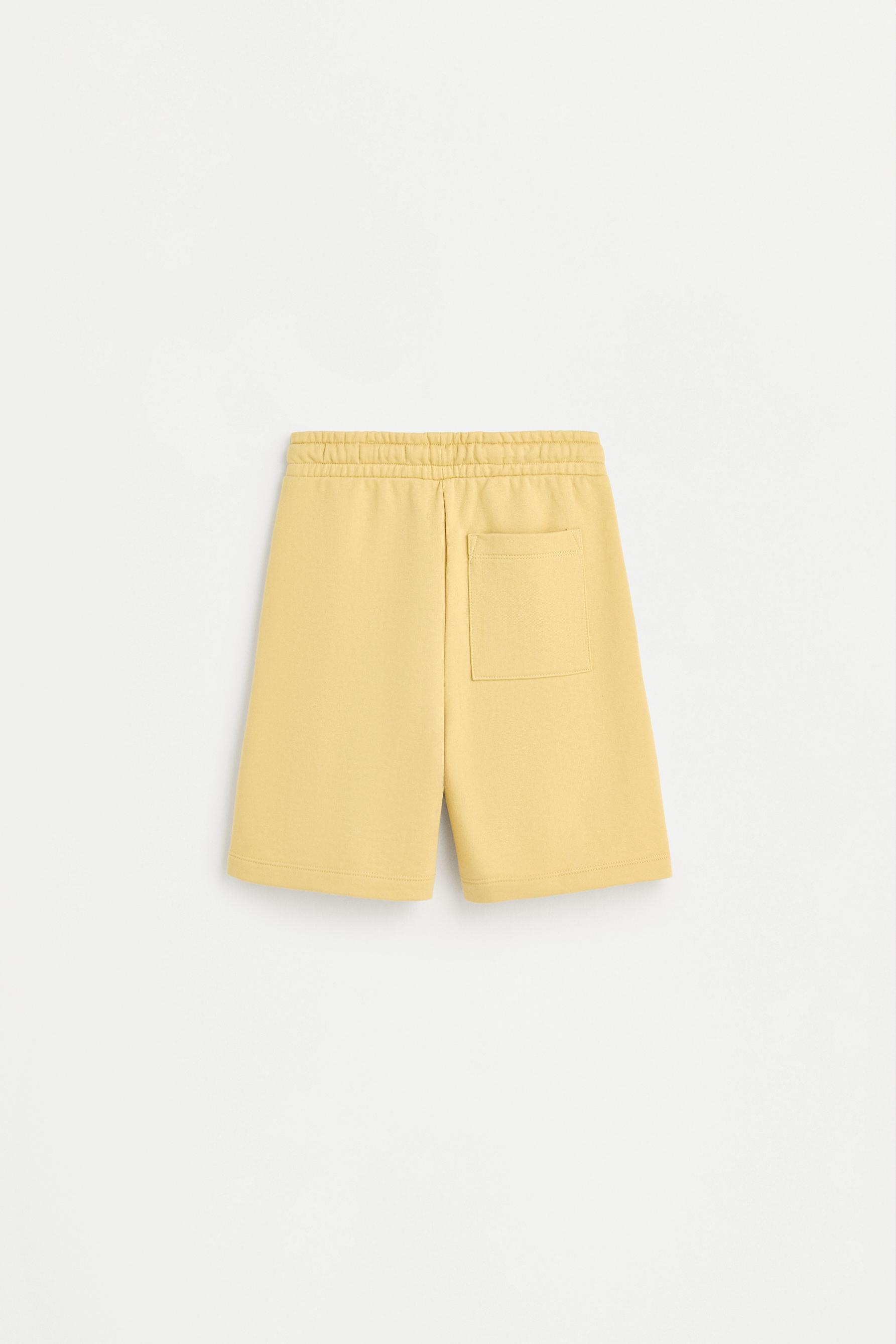 Text print plush Bermuda shorts — MUSTARD