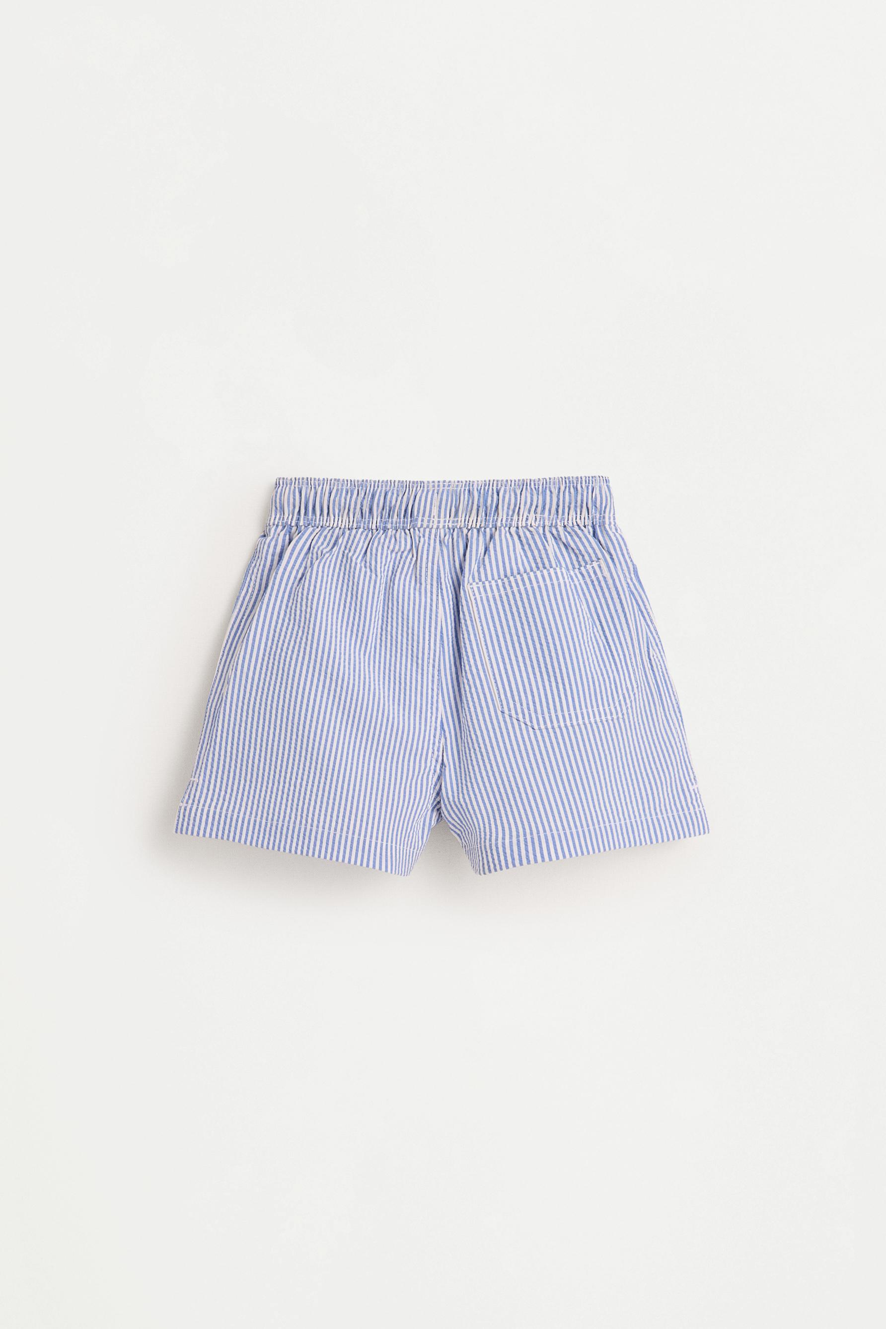 Striped seersucker swim shorts — BLUE