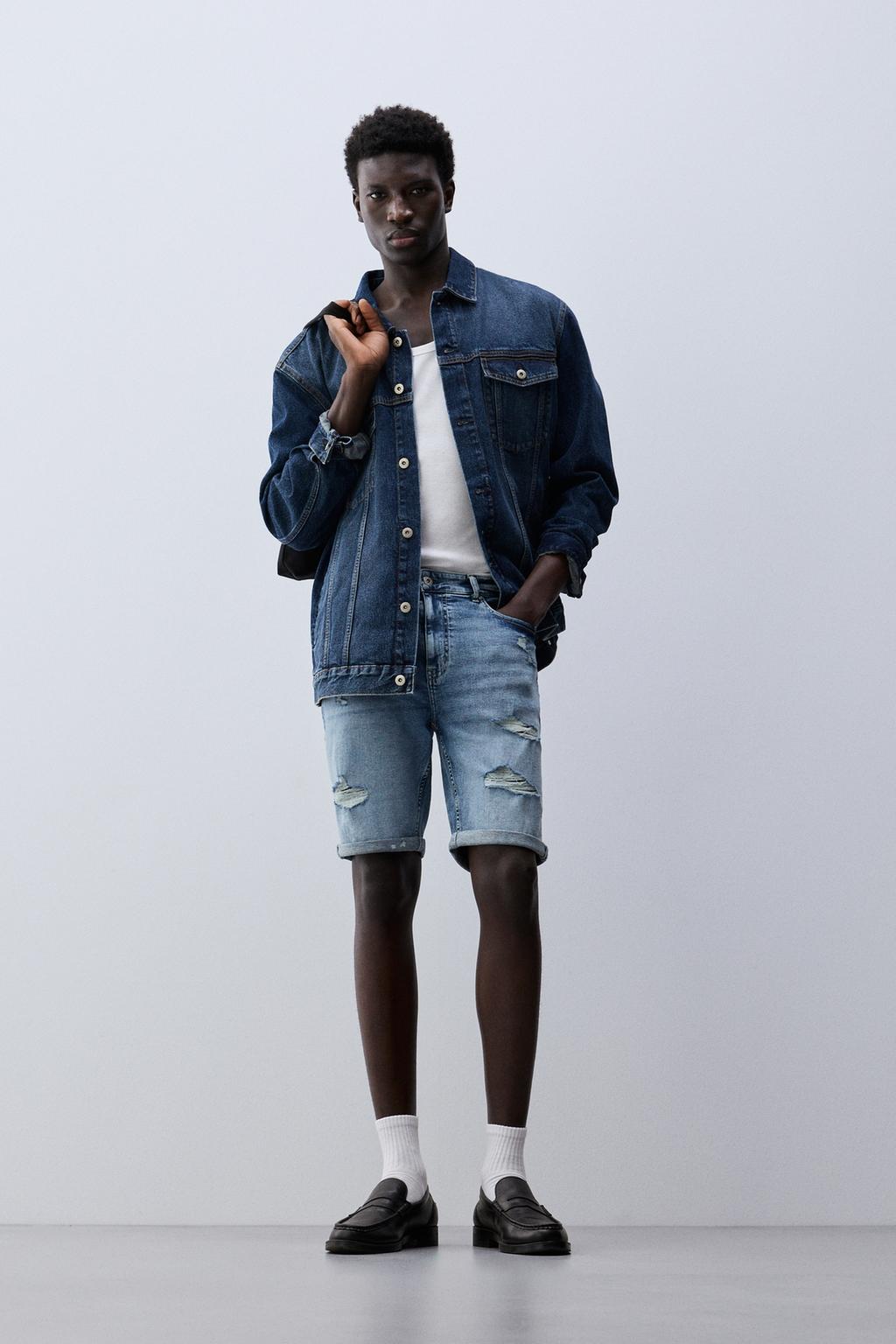 Skinny denim Bermuda shorts with rips