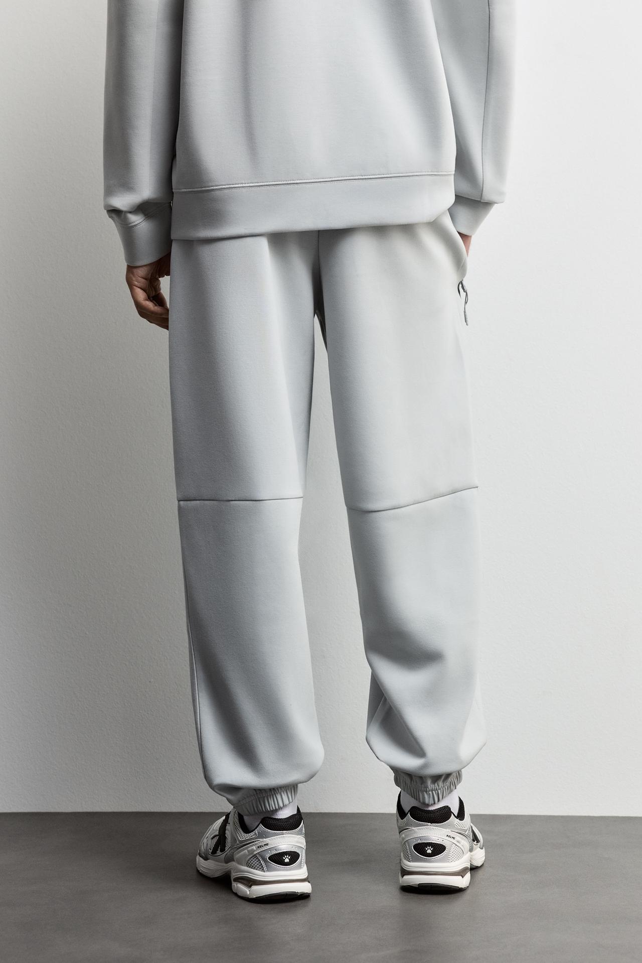 Wide-leg interlock trousers — GREY MARL