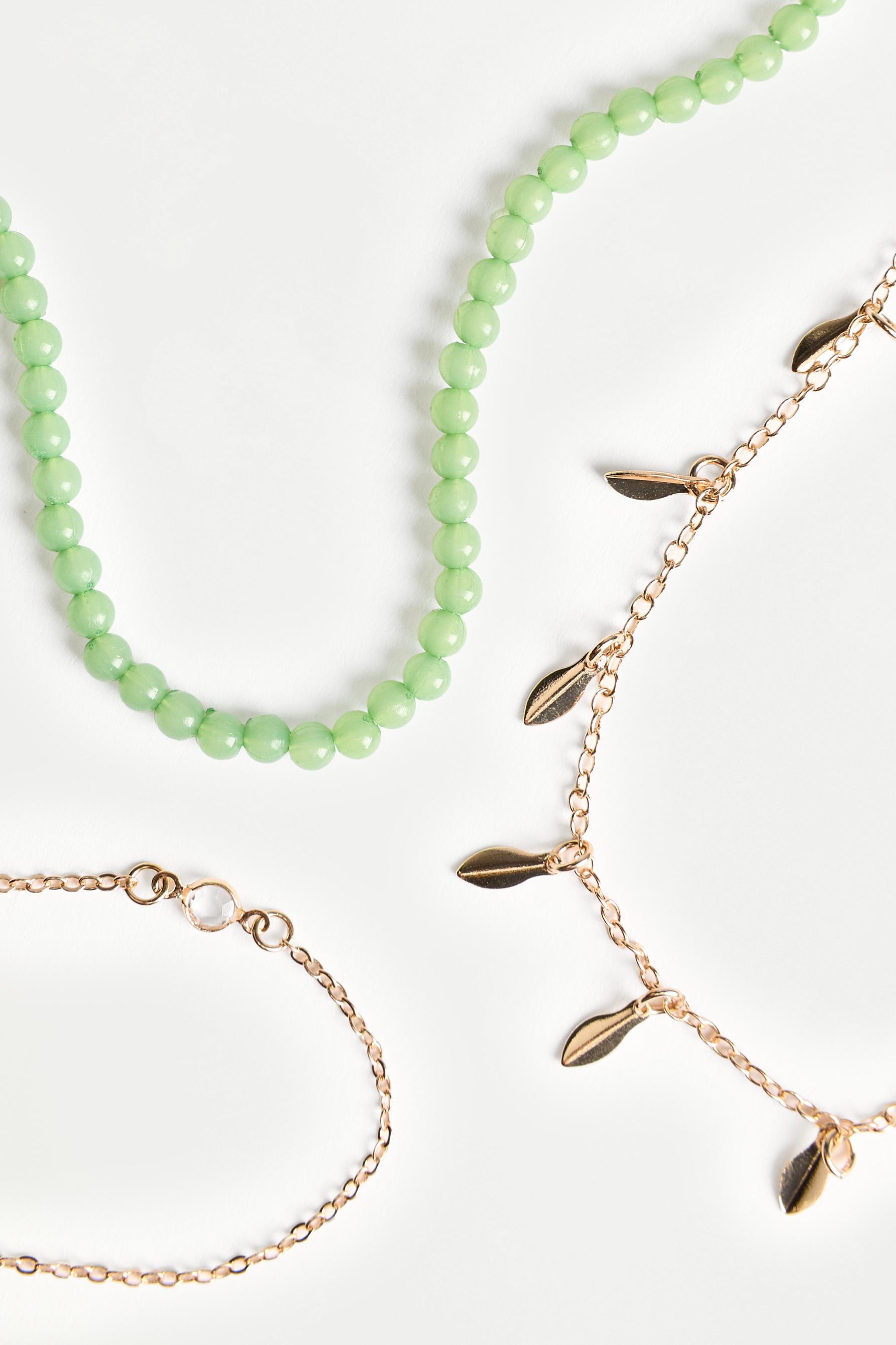 Layered bead and coin necklace — GOLDEN
