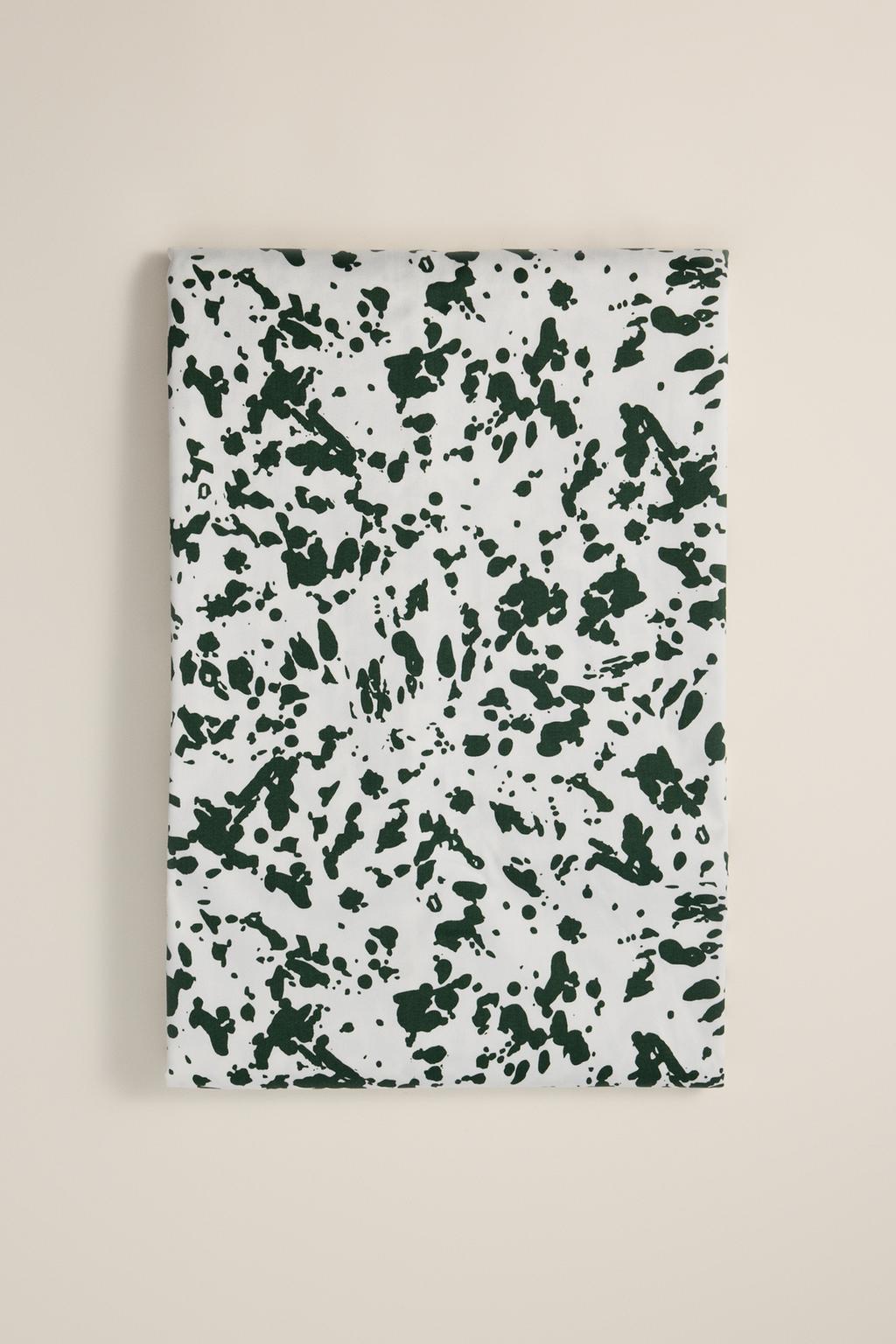 Mantel estampado manchas 240 x 140 cm
