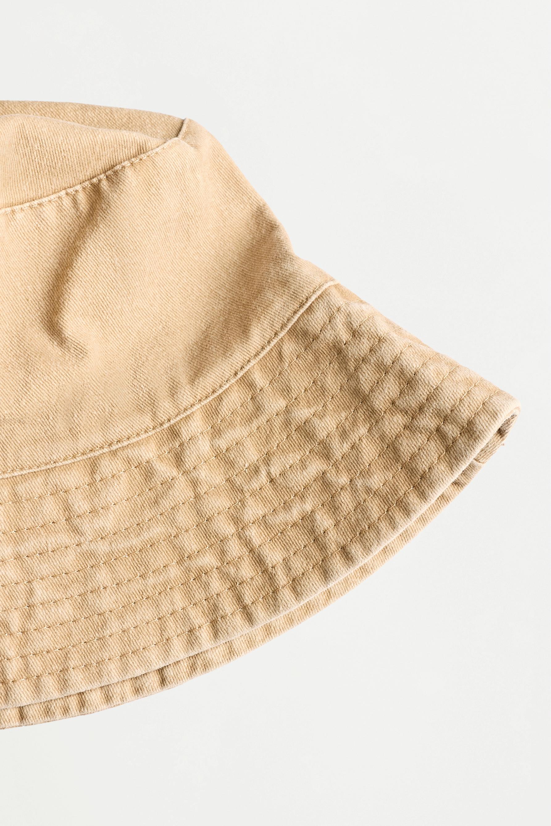 Faded-effect bucket hat — BEIGE