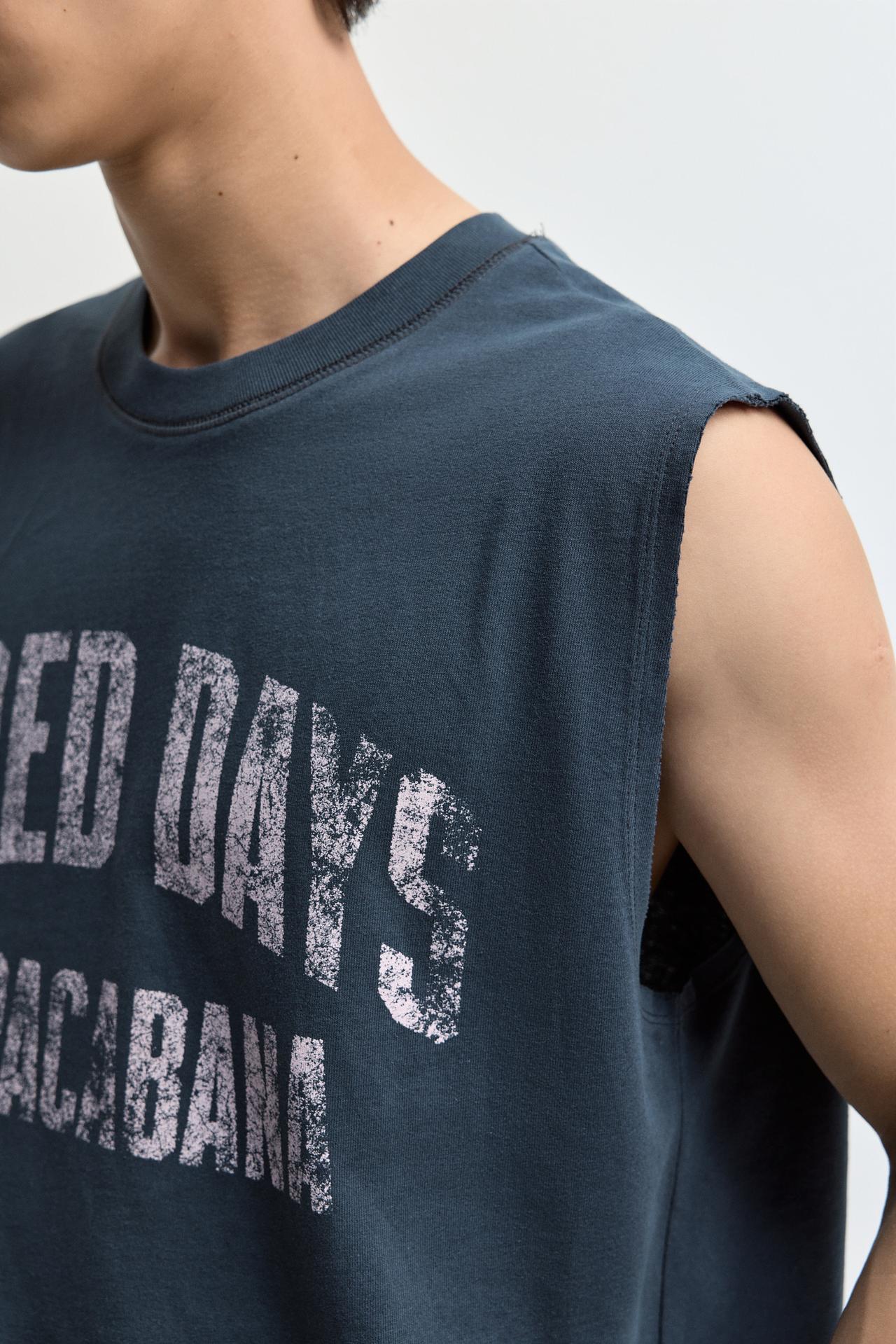Faded-effect printed sleeveless T-shirt — DARK BLUE