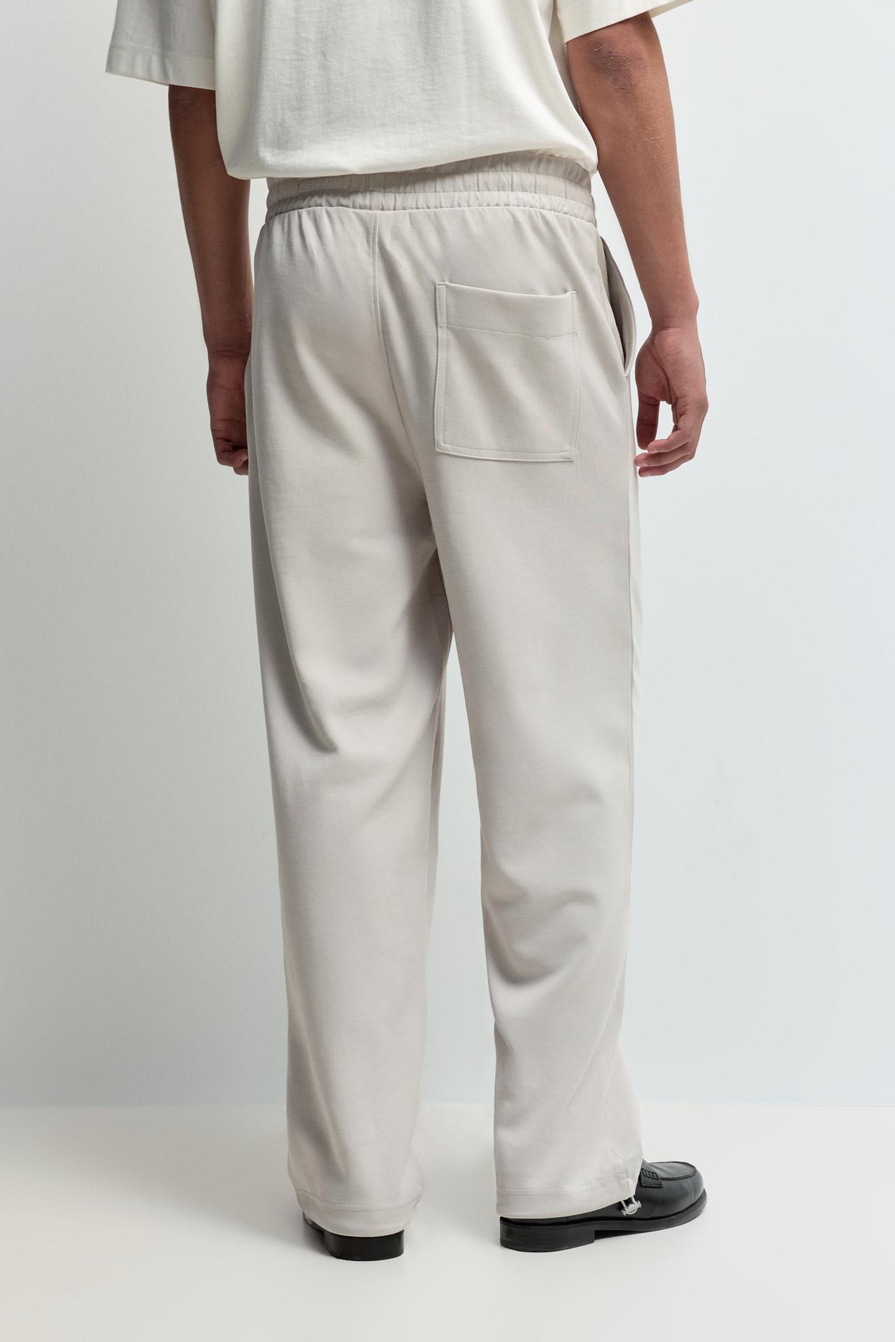 Interlock baggy trousers — PALE GREY