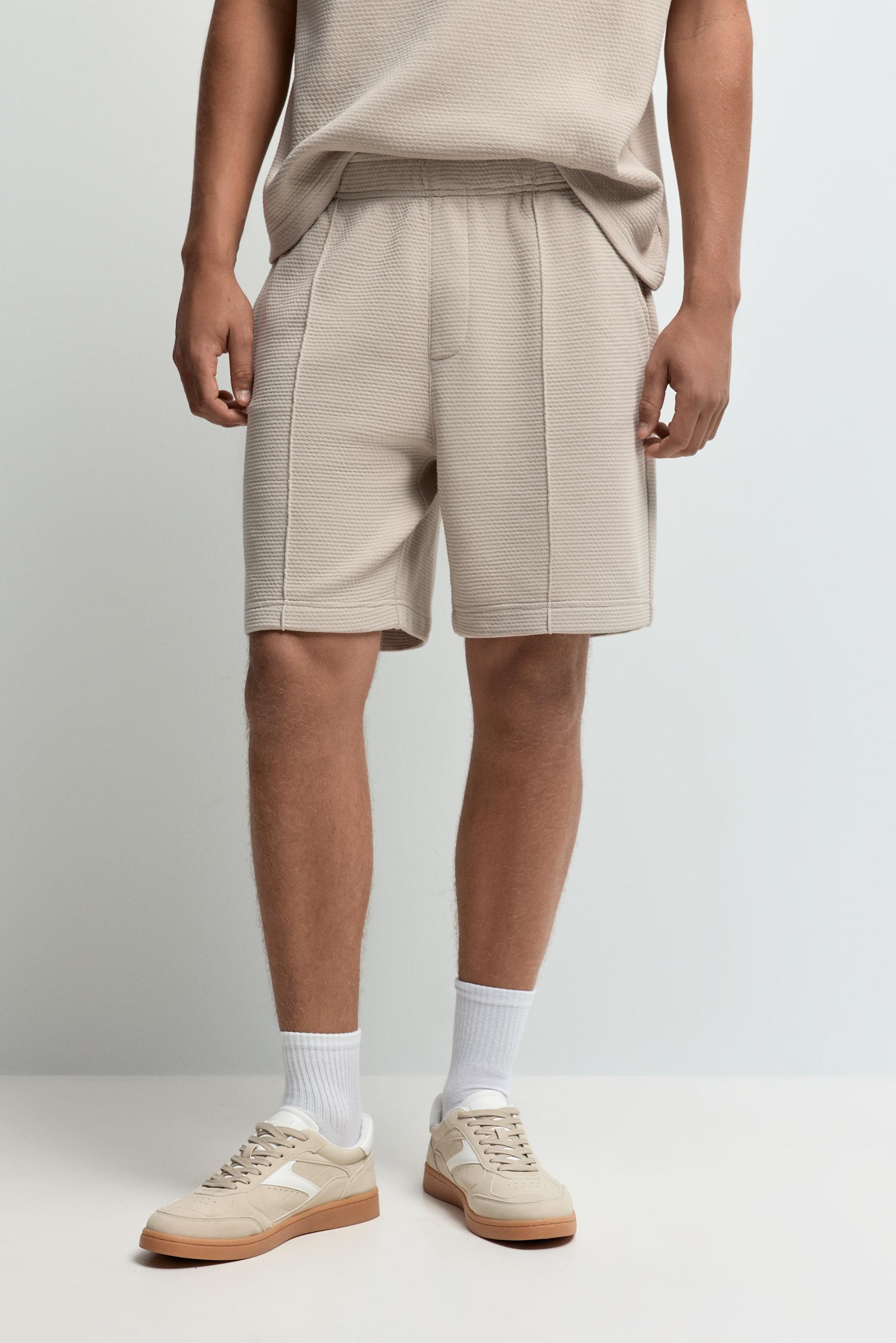 Waffle-textured Bermuda shorts — PALE SAND