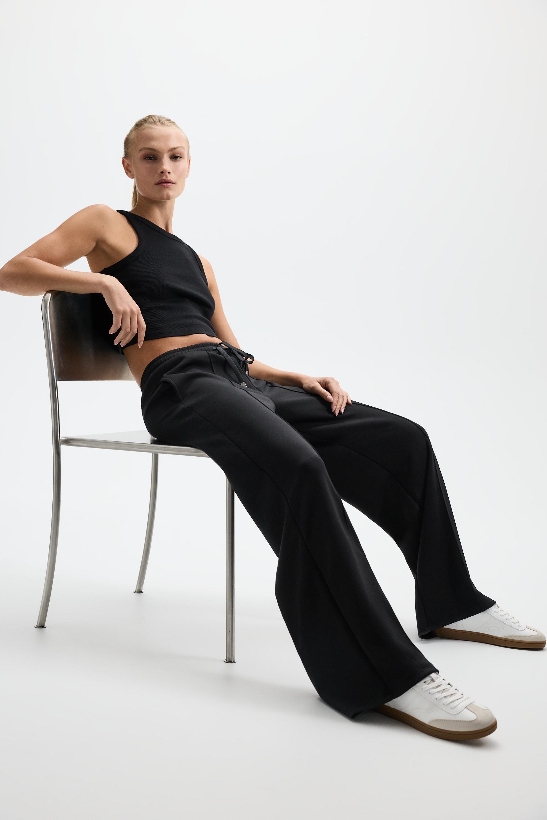 Wide-leg tracksuit trousers with front seam — BLACK