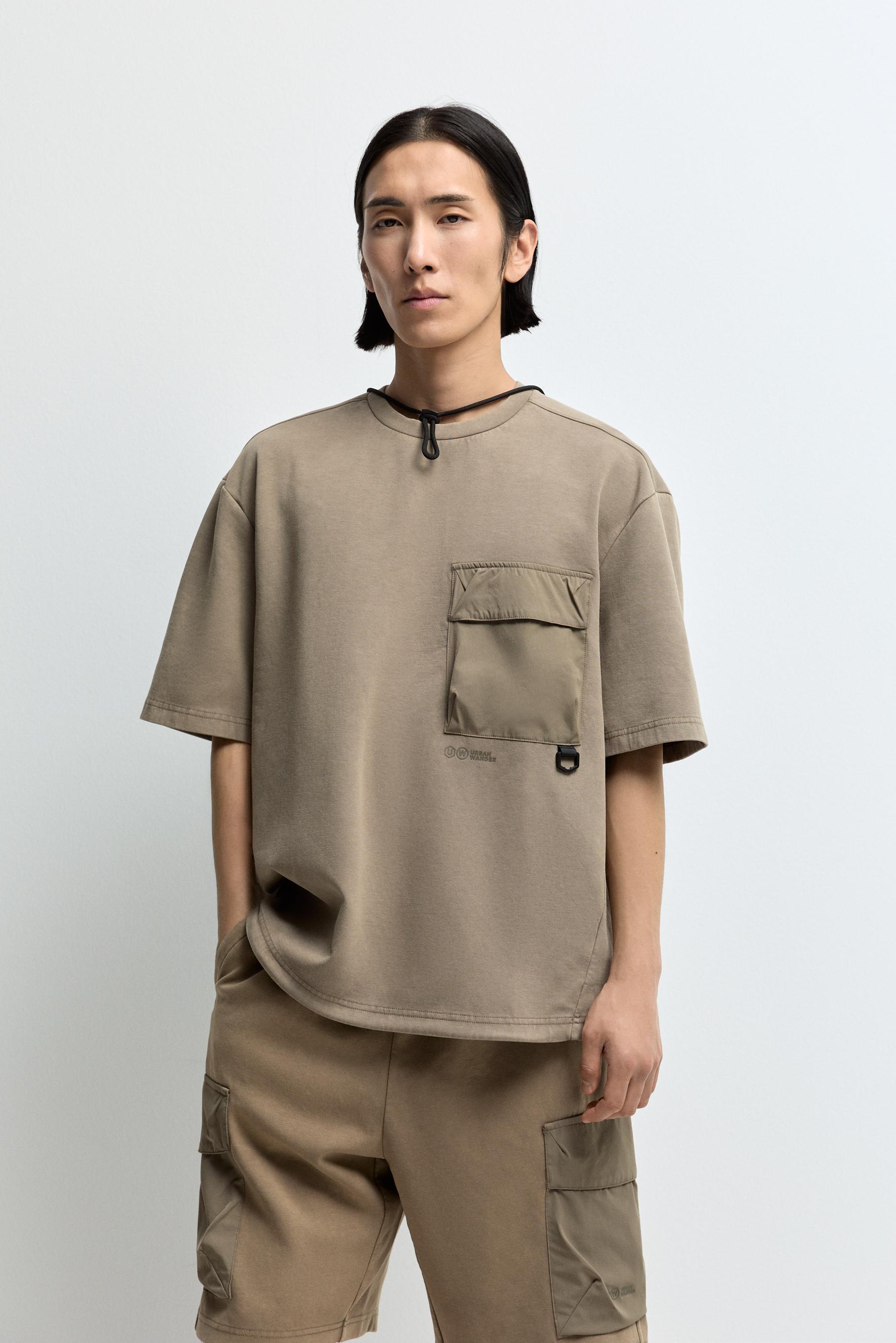 Camiseta interlock outdoor bolsillo anilla