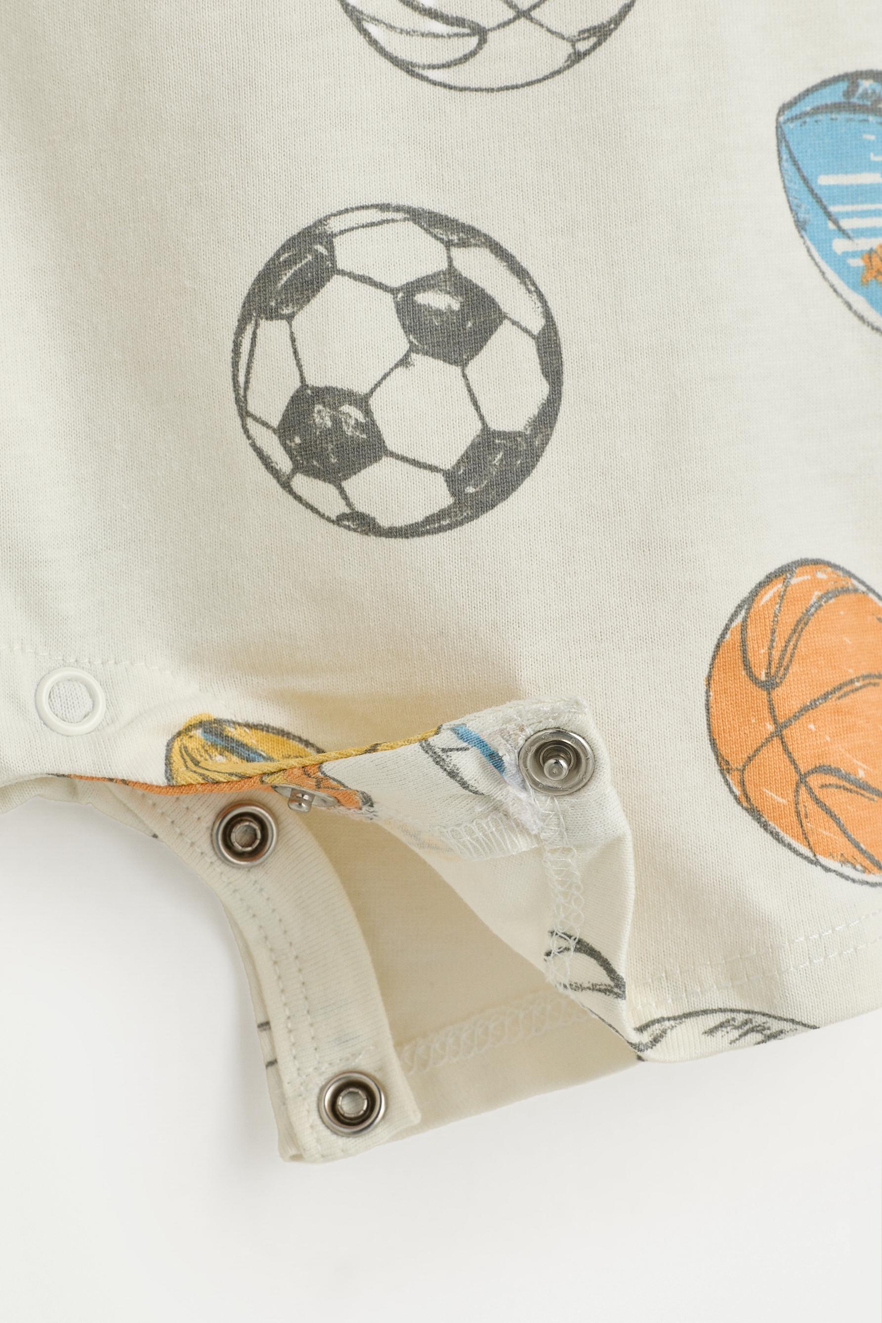 All-over printed short sleepsuit — ECRU