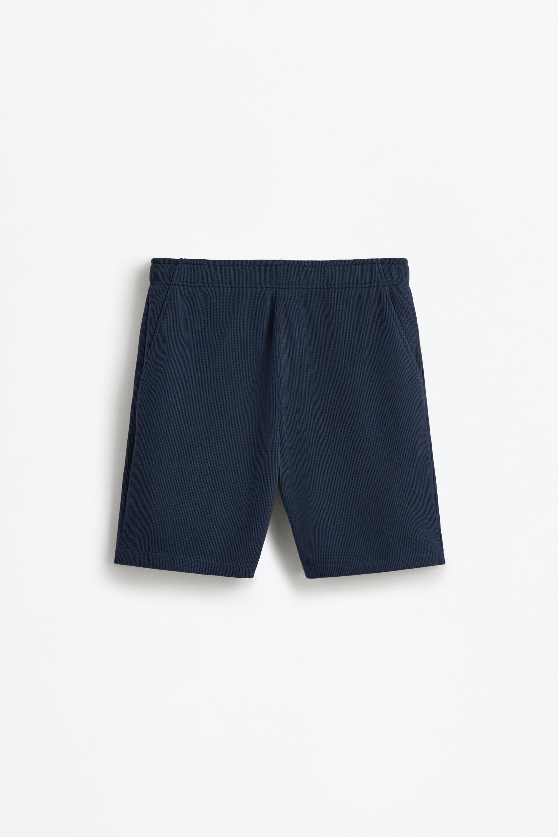 Waffle-knit textured Bermuda shorts — NAVY