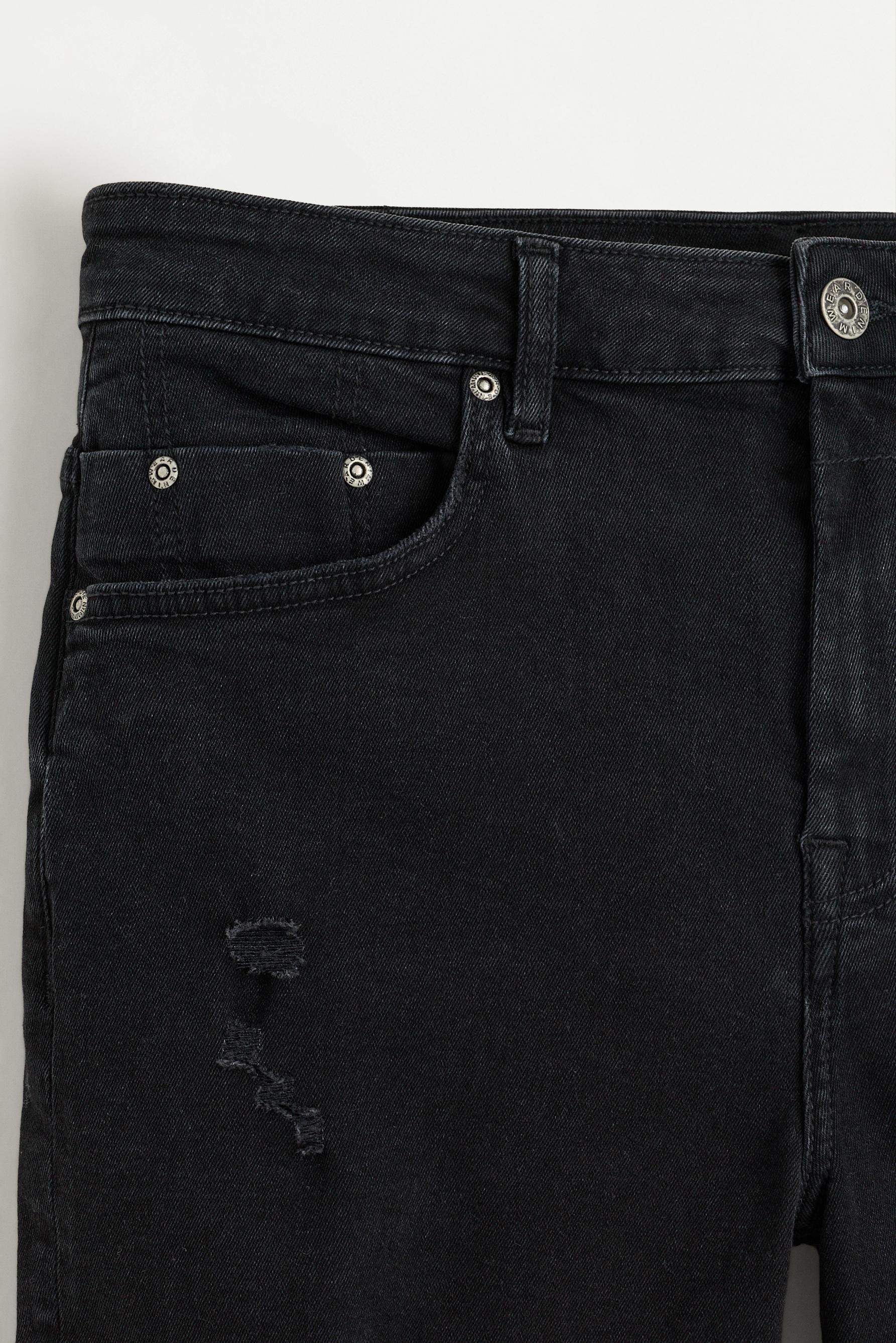 Distressed skinny denim Bermuda shorts — BLACK