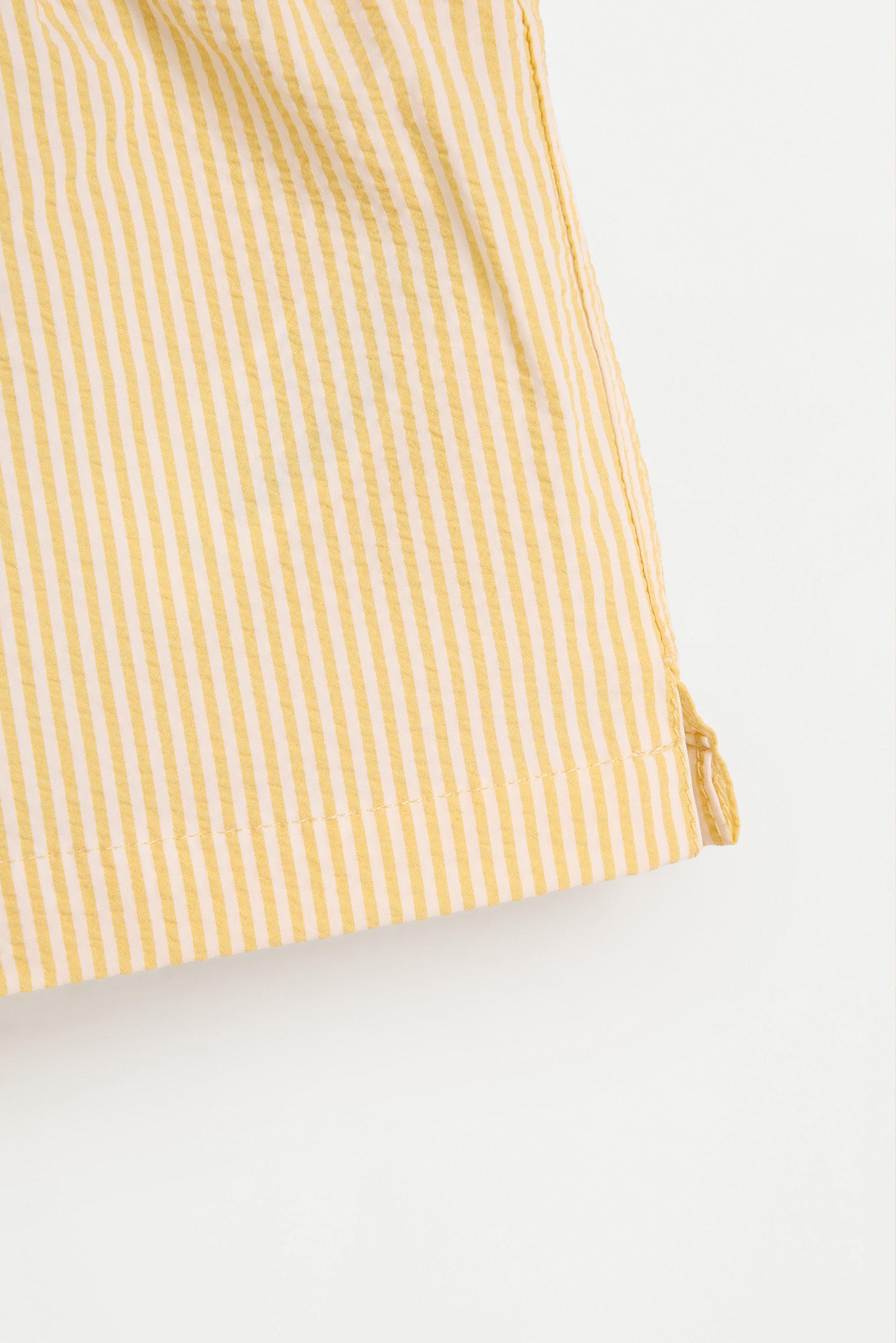 Striped seersucker swim shorts — LEMON YELLOW
