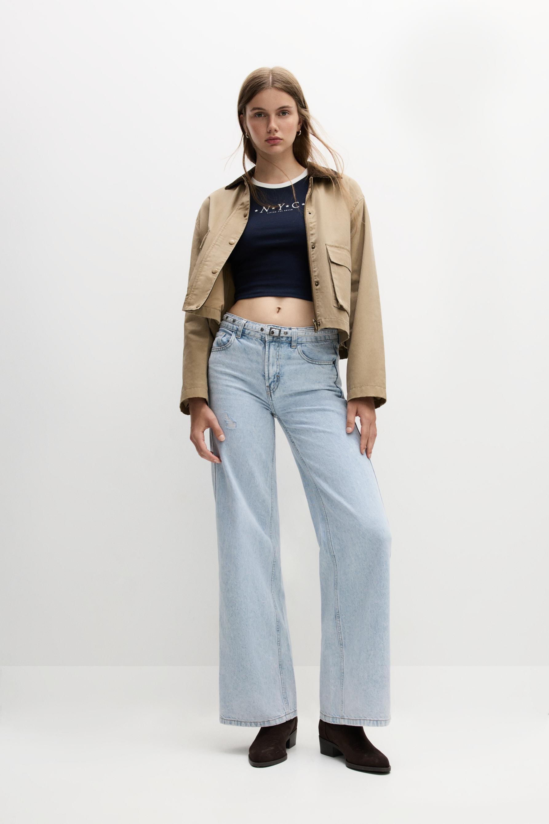 Jeans wide leg cinturón tachas