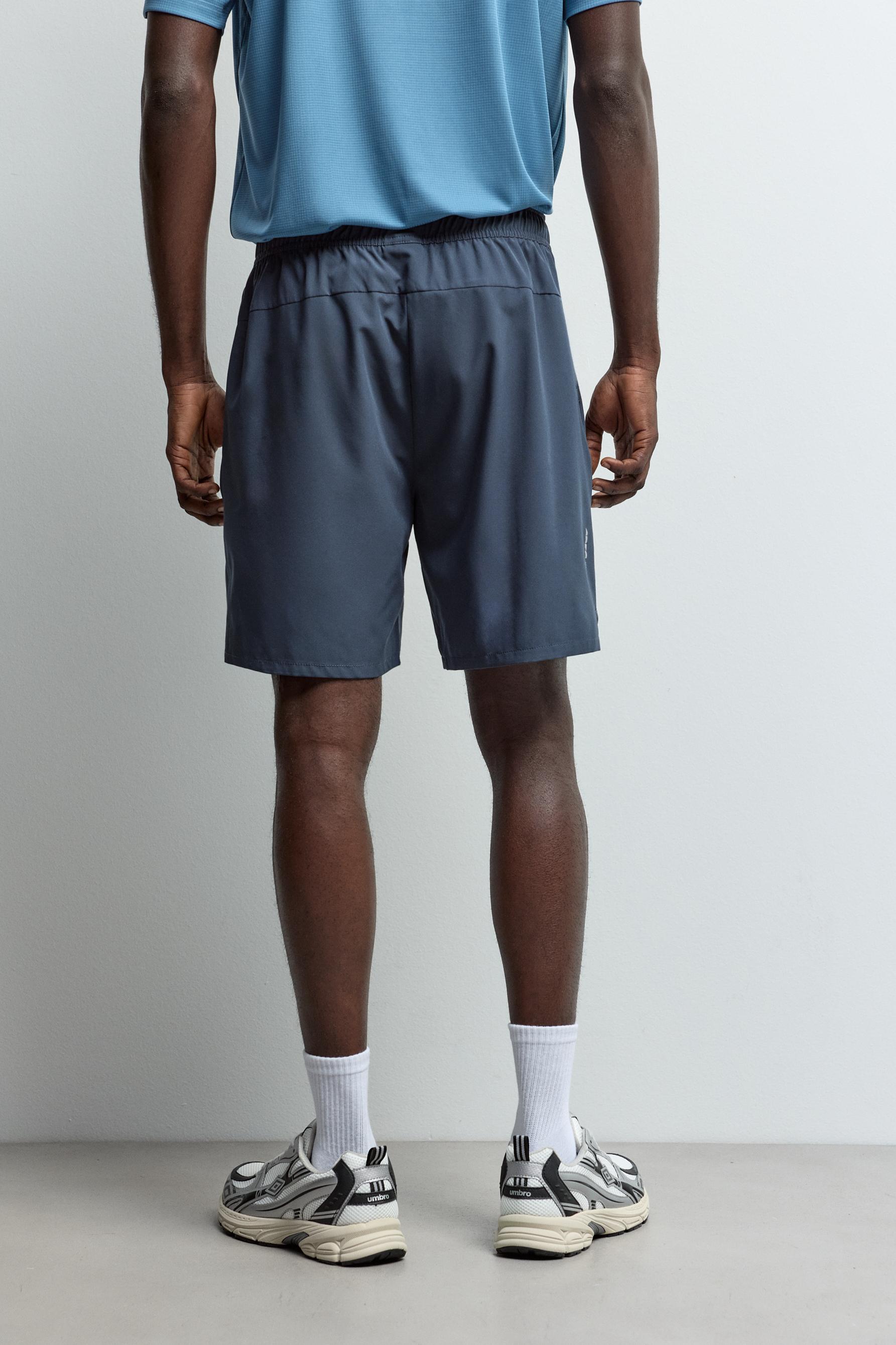 Training Bermuda shorts — DARK BLUE