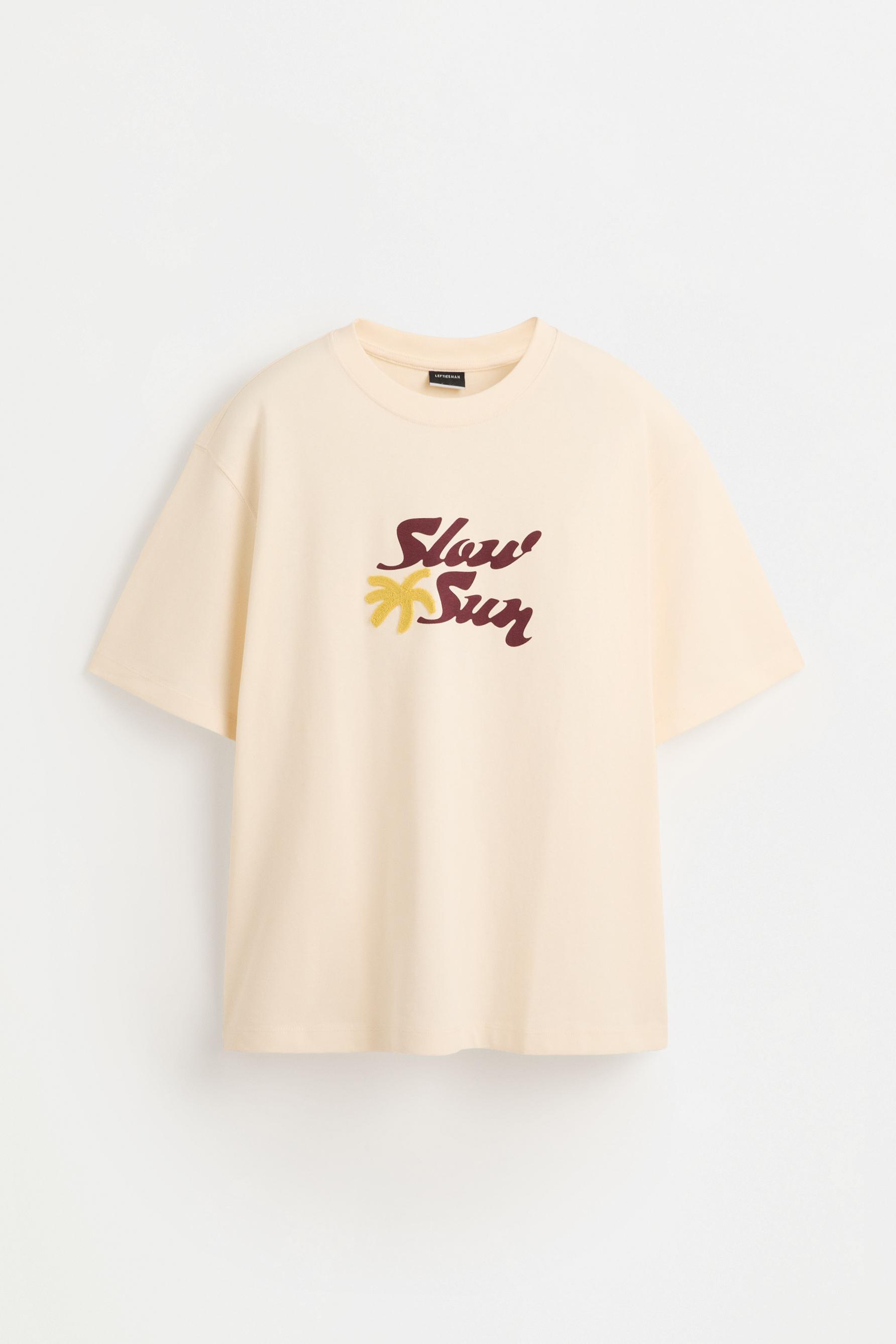 Embroidered text T-shirt — BUTTER