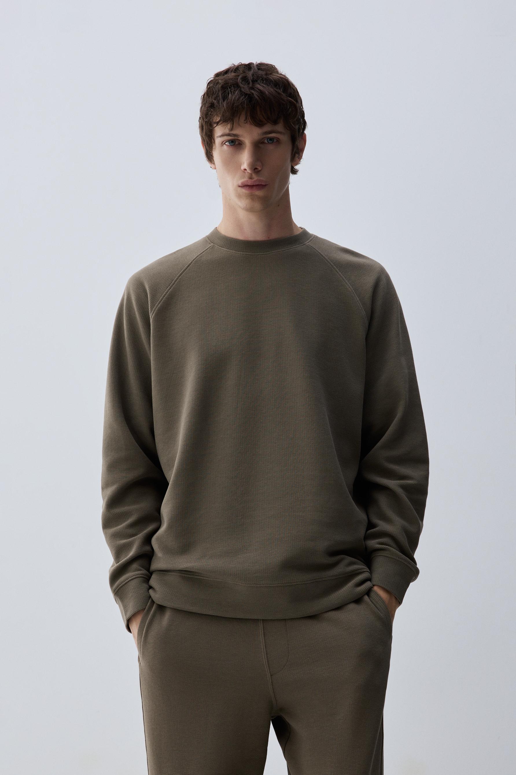 Sudadera textura manga ranglan