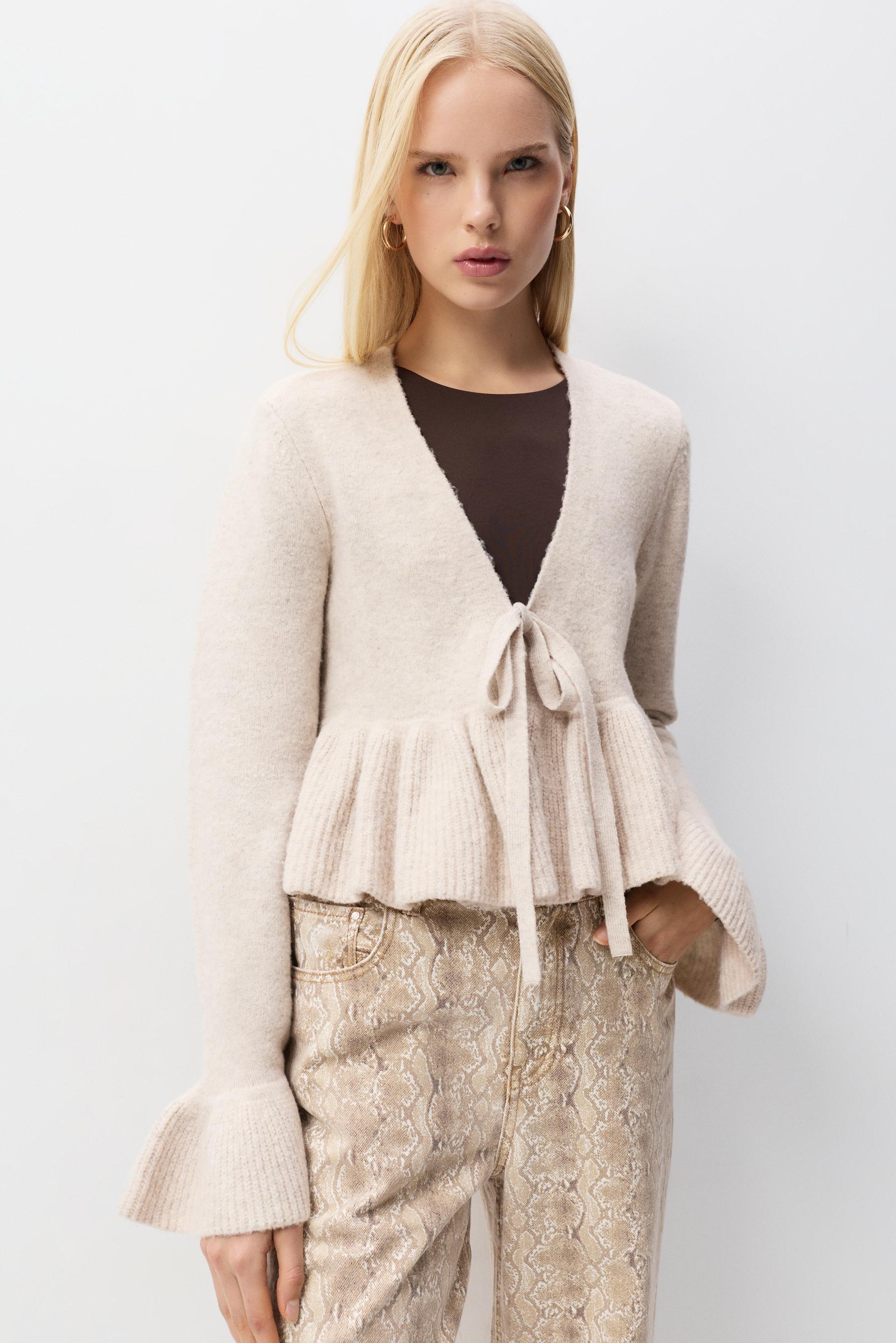 Chaqueta peplum punto