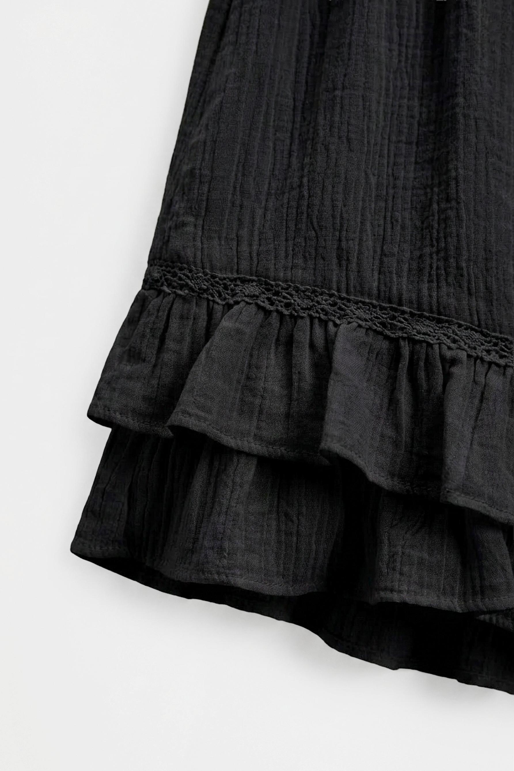 Flowing ruffled skort — BLACK