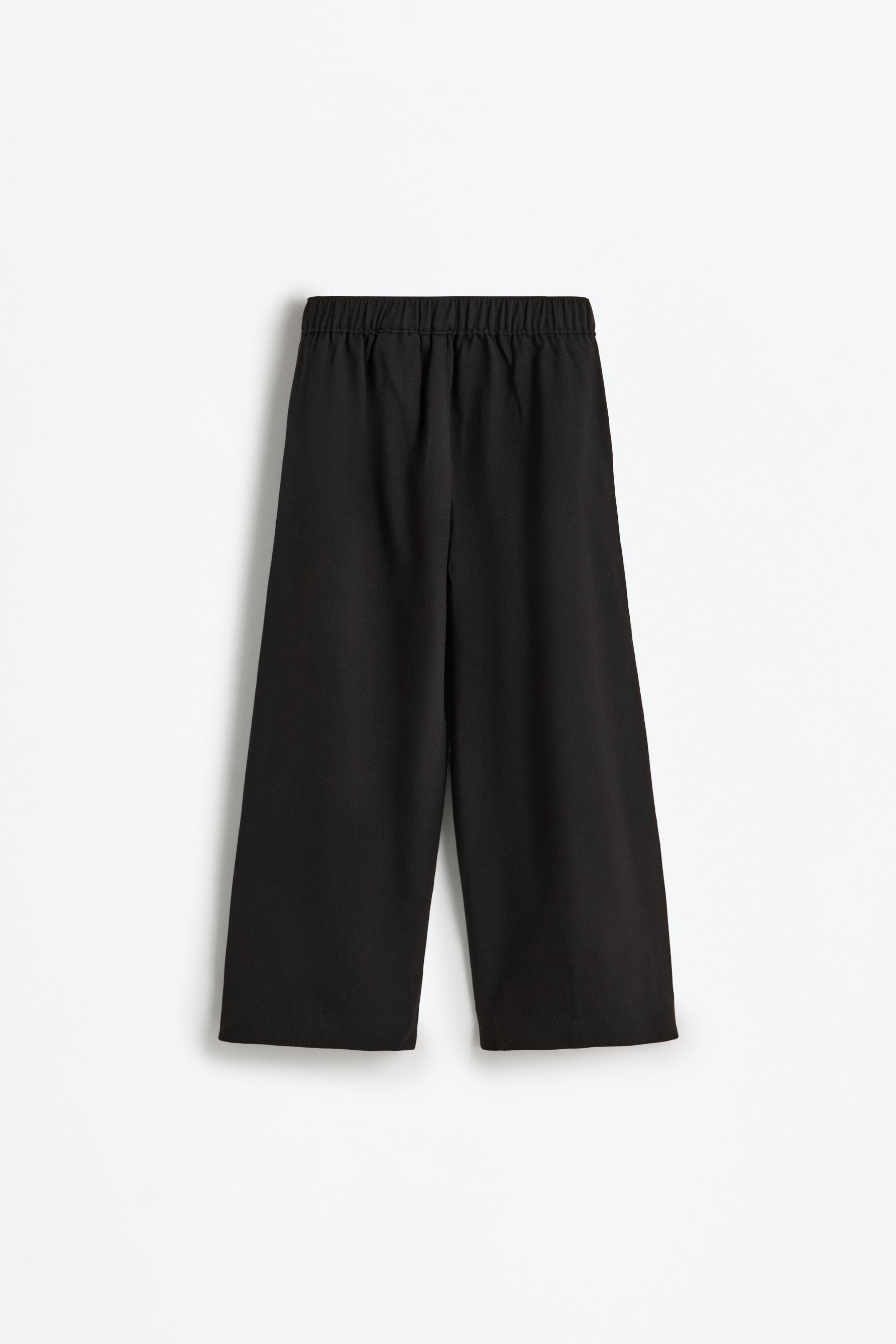 Pleated trousers — BLACK