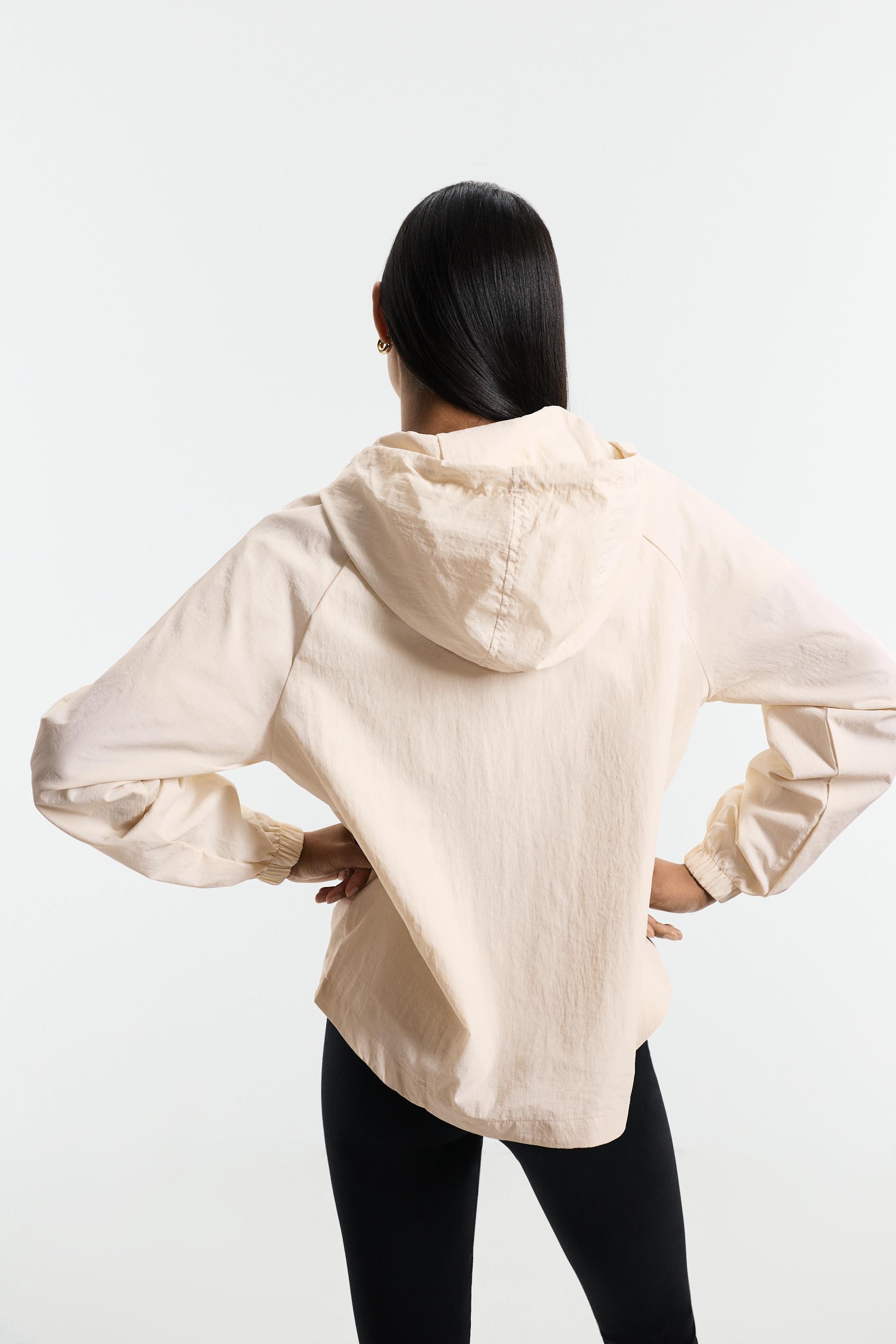Cropped hooded windbreaker — ECRU