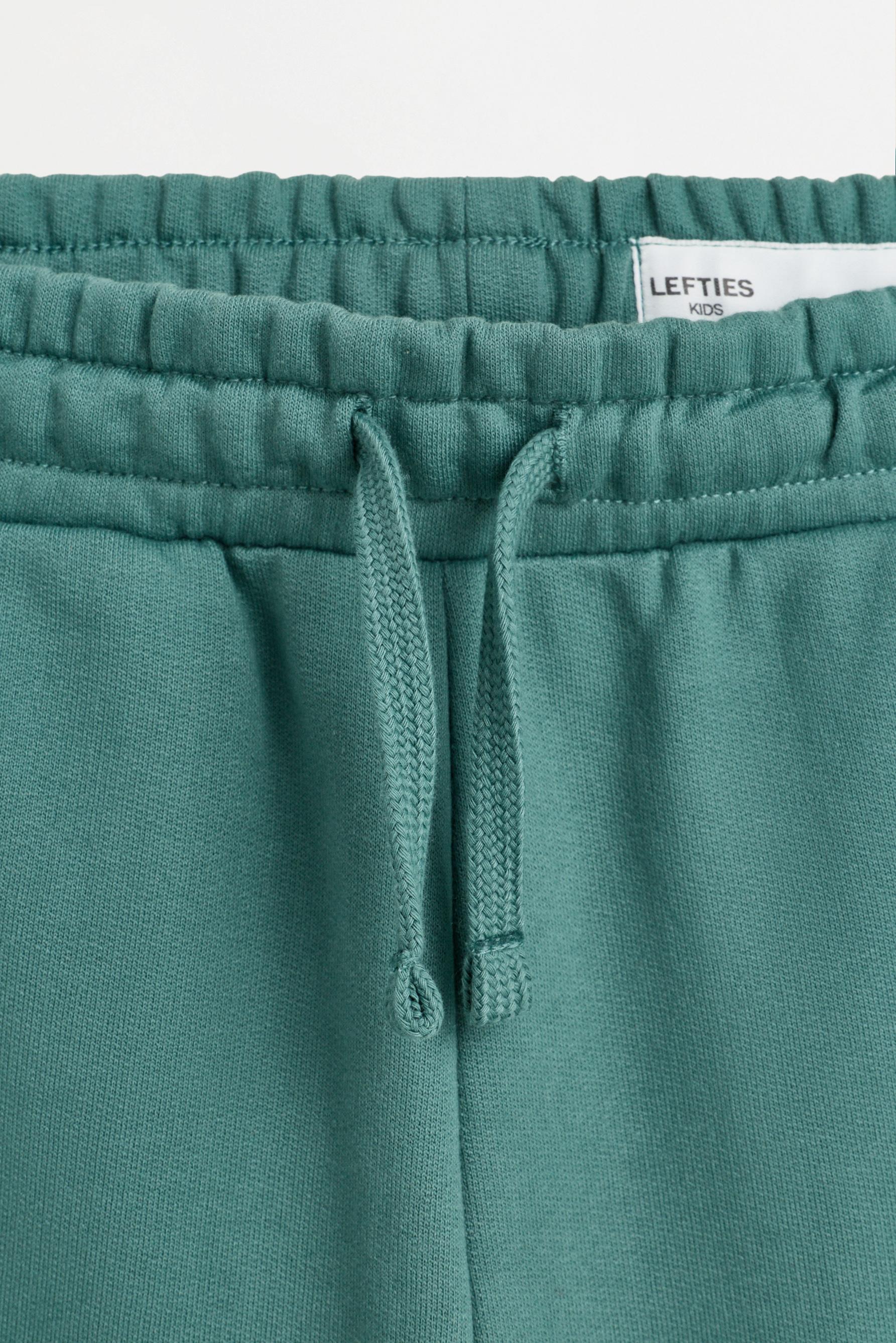 Text print plush Bermuda shorts — PALE MINT GREEN