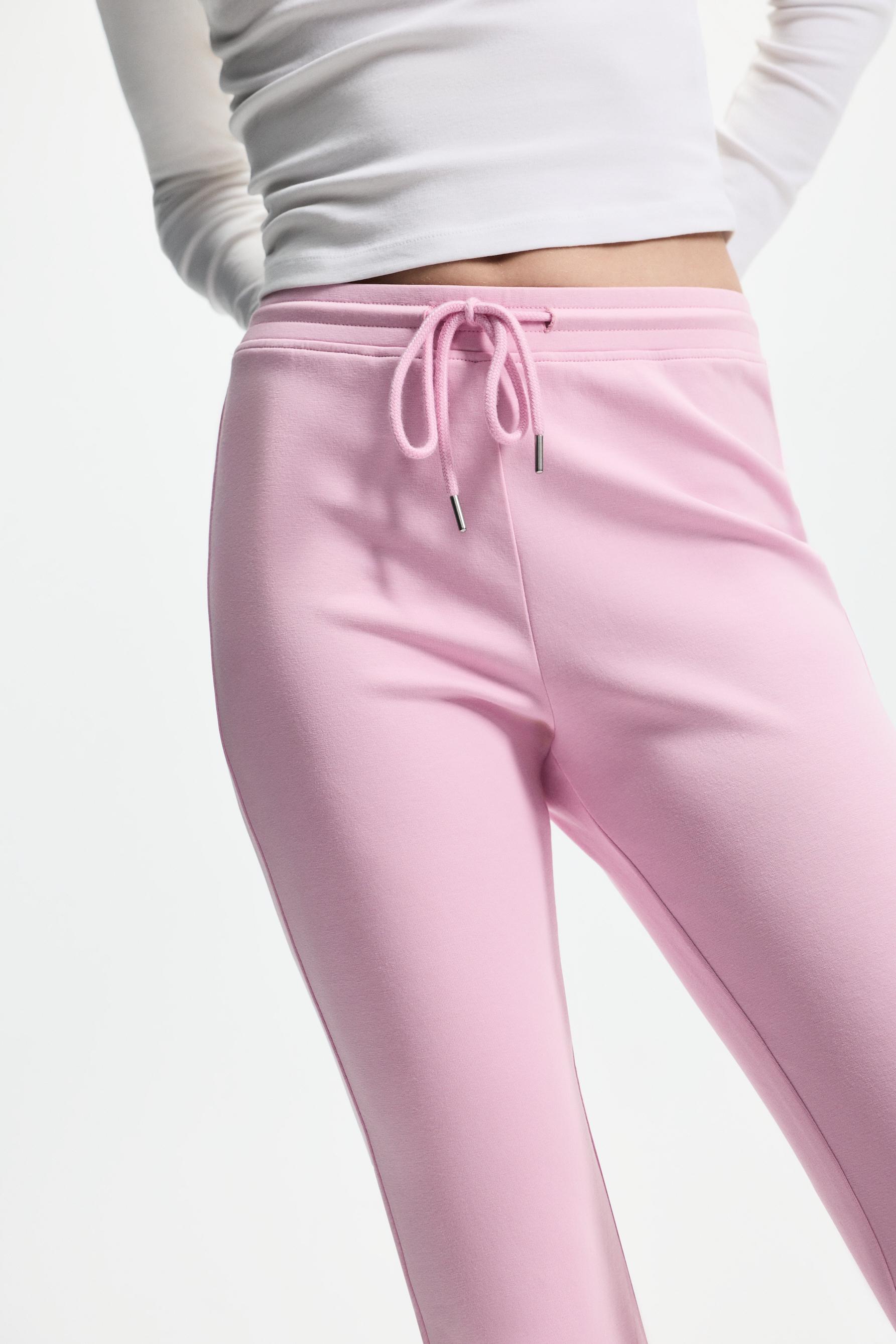 Basic interlock bell bottom trousers — PASTEL PINK