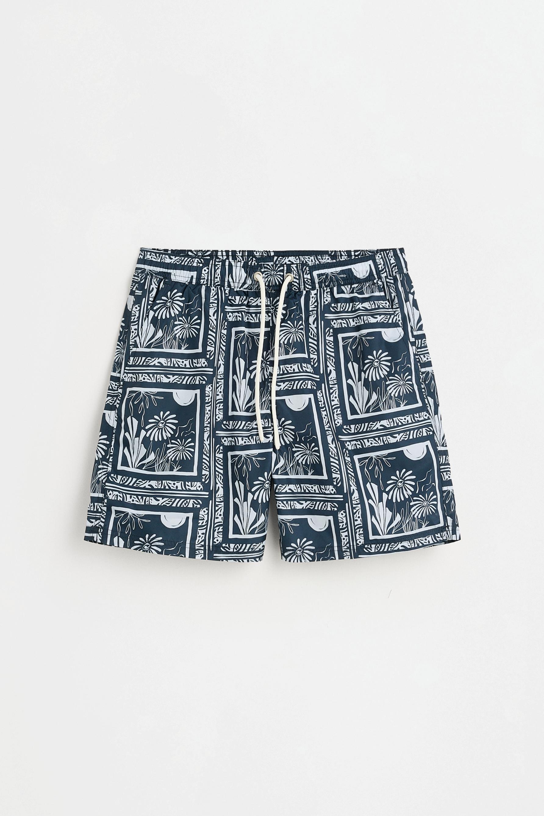 Printed regular fit swim shorts — NAVY