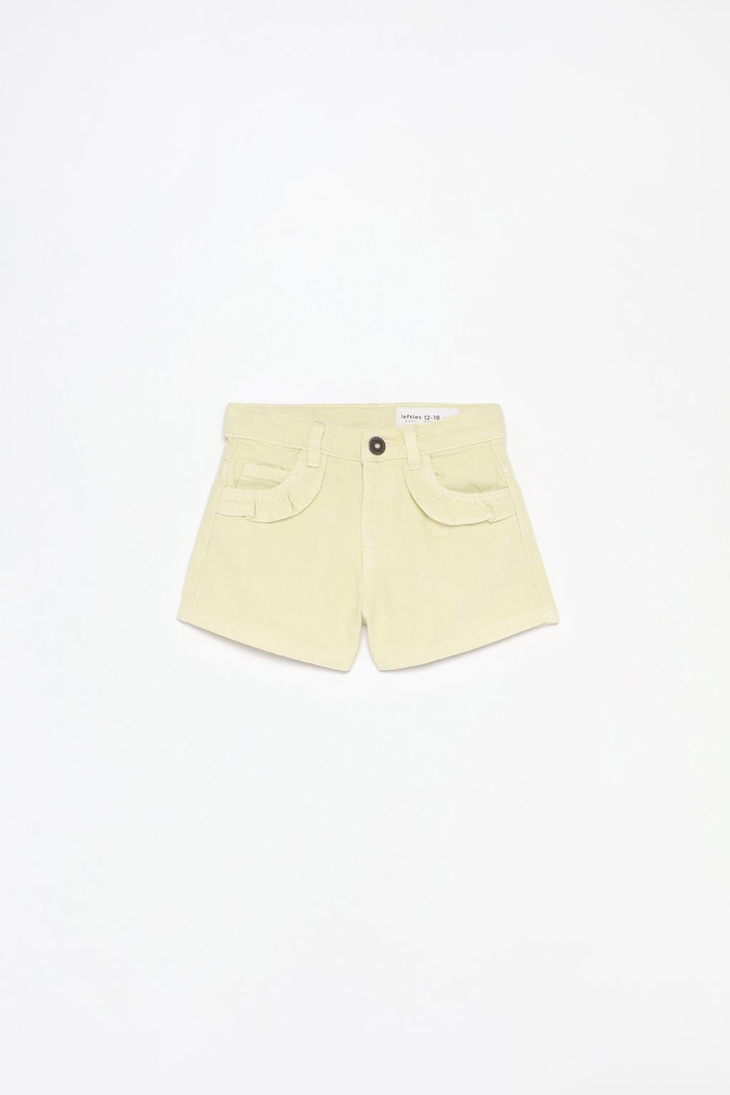 Short in denim con volant