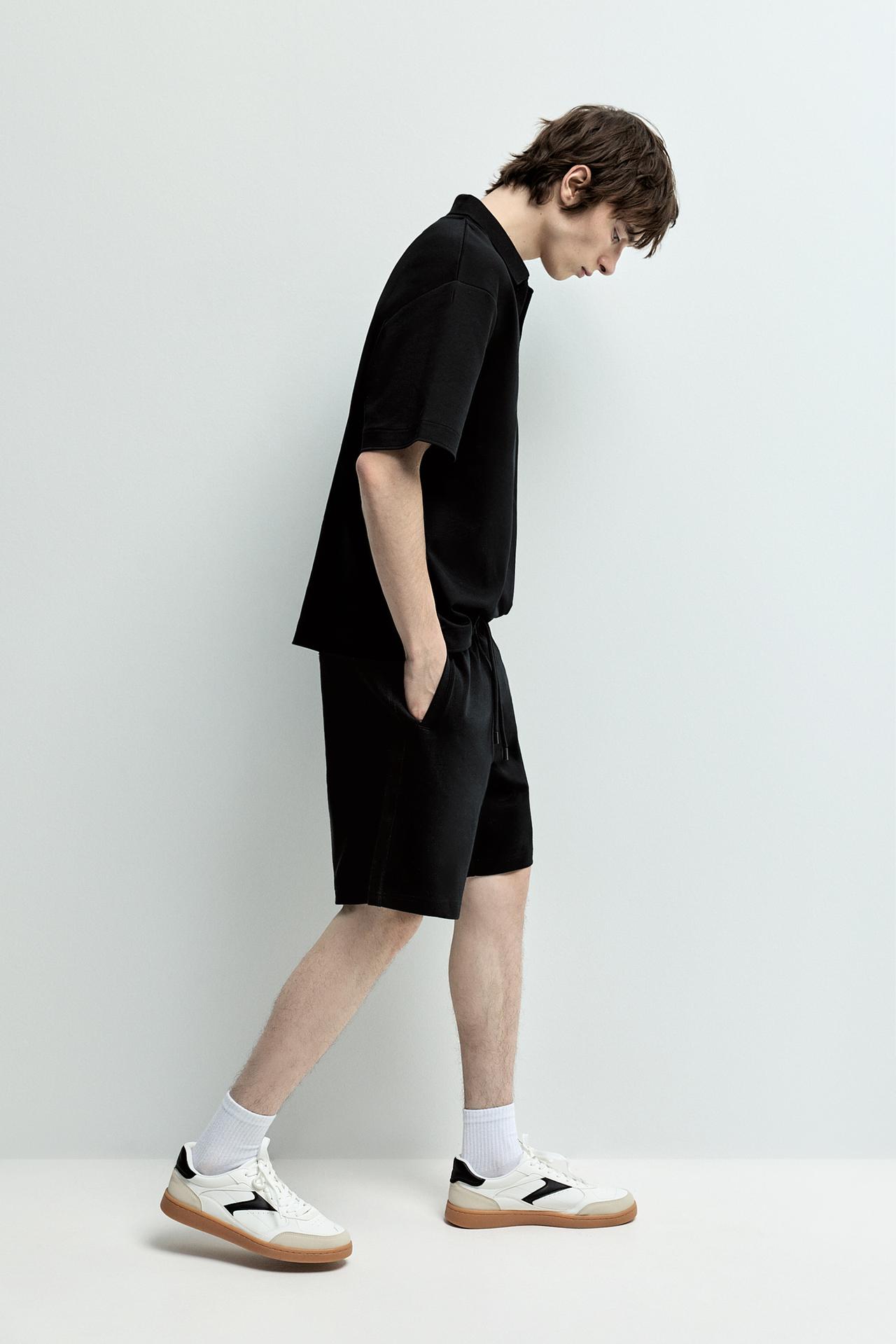 CARAMEL FLAT SLIPPERS — BLACK
