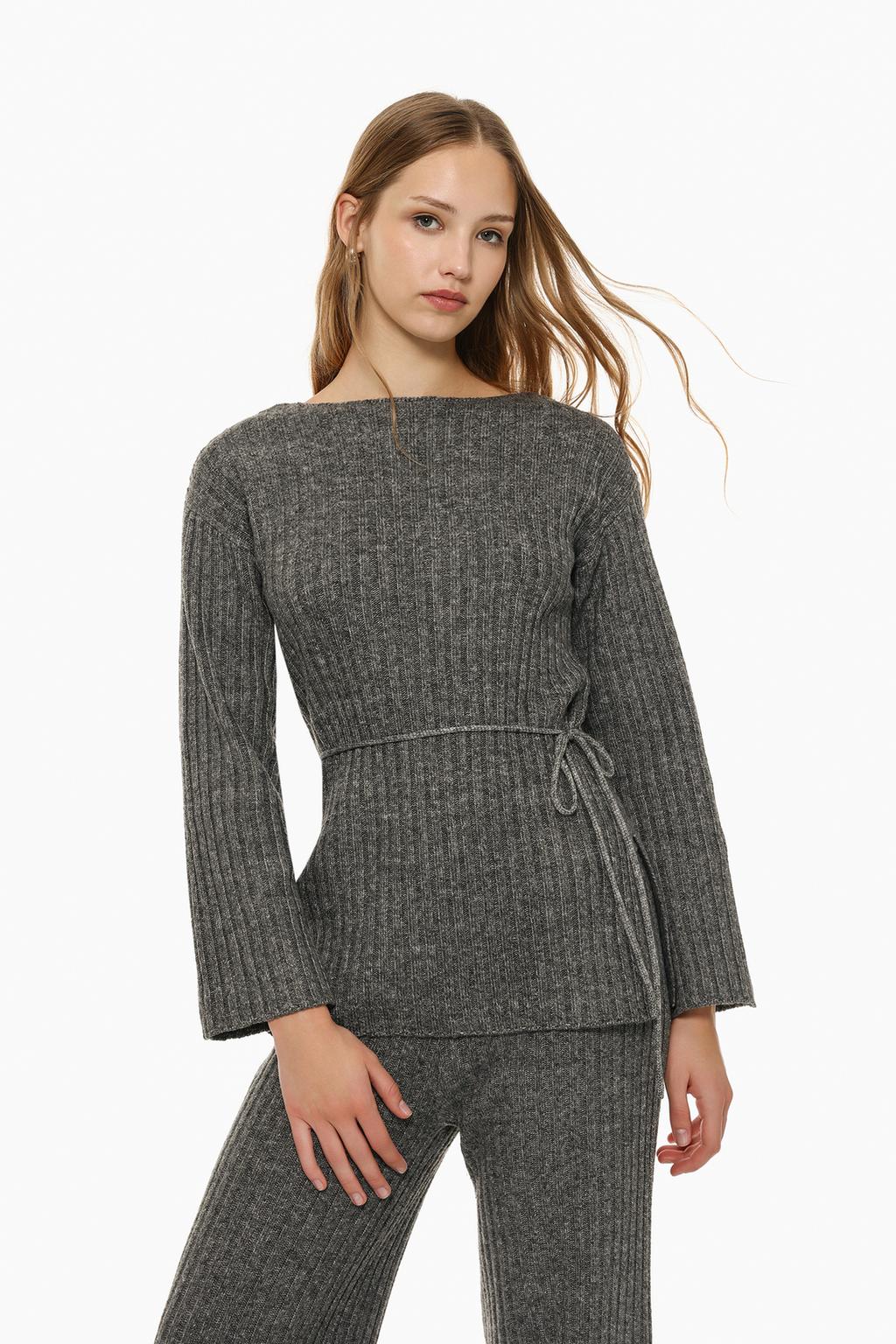 Long belted sweater