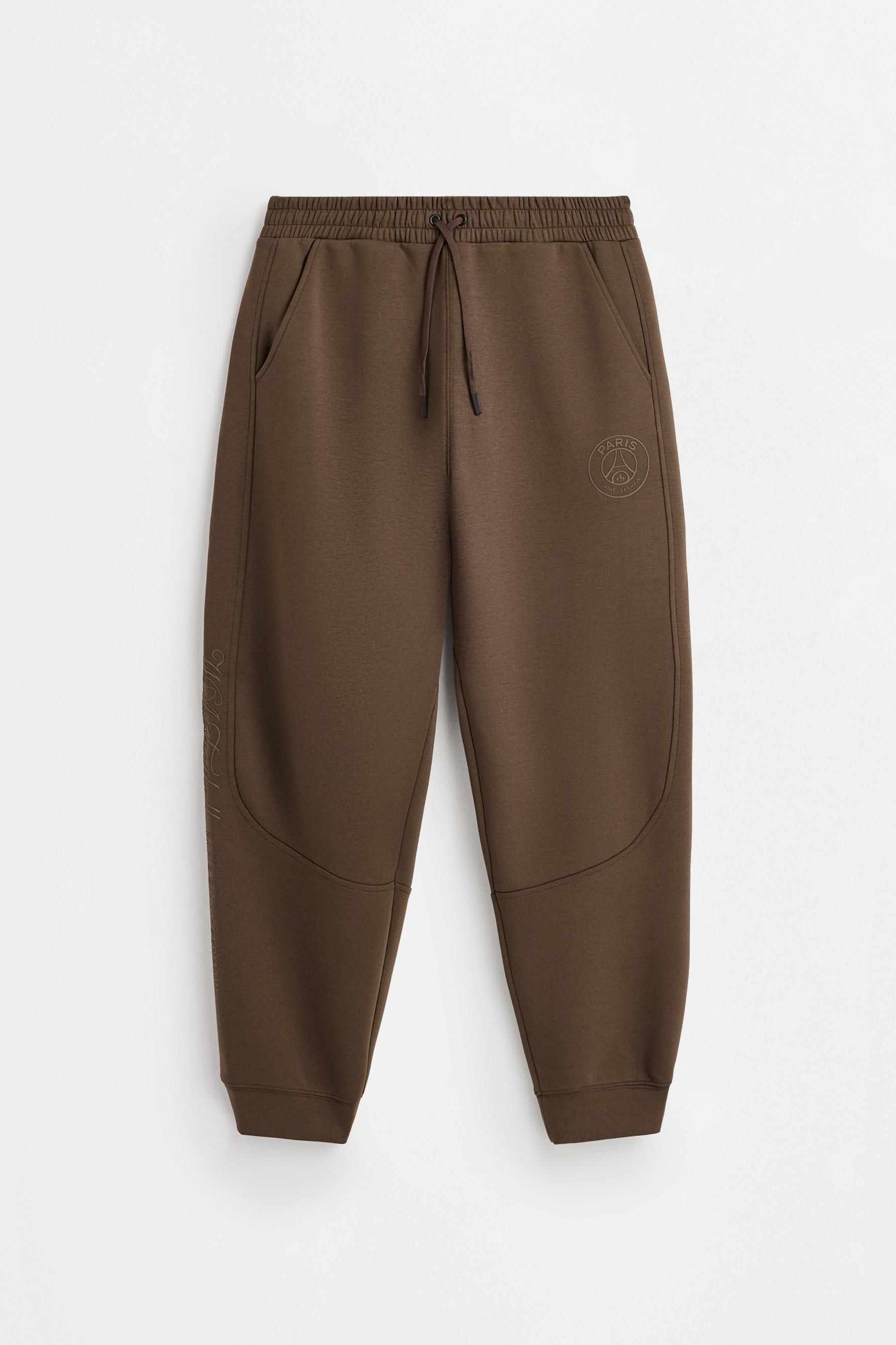 Paris Saint-Germain interlock pants — BROWN