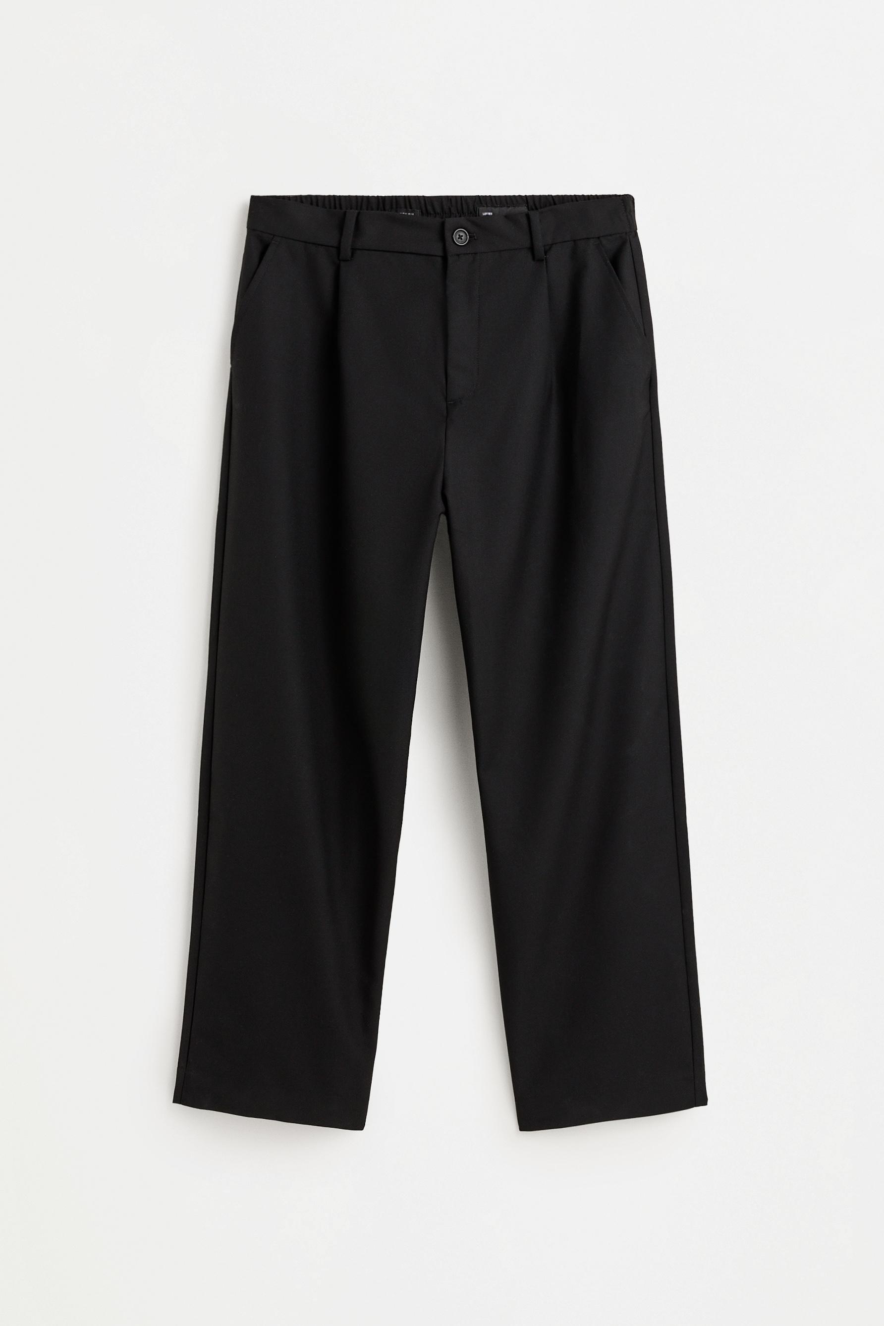 Baggy trousers with darts — BLACK