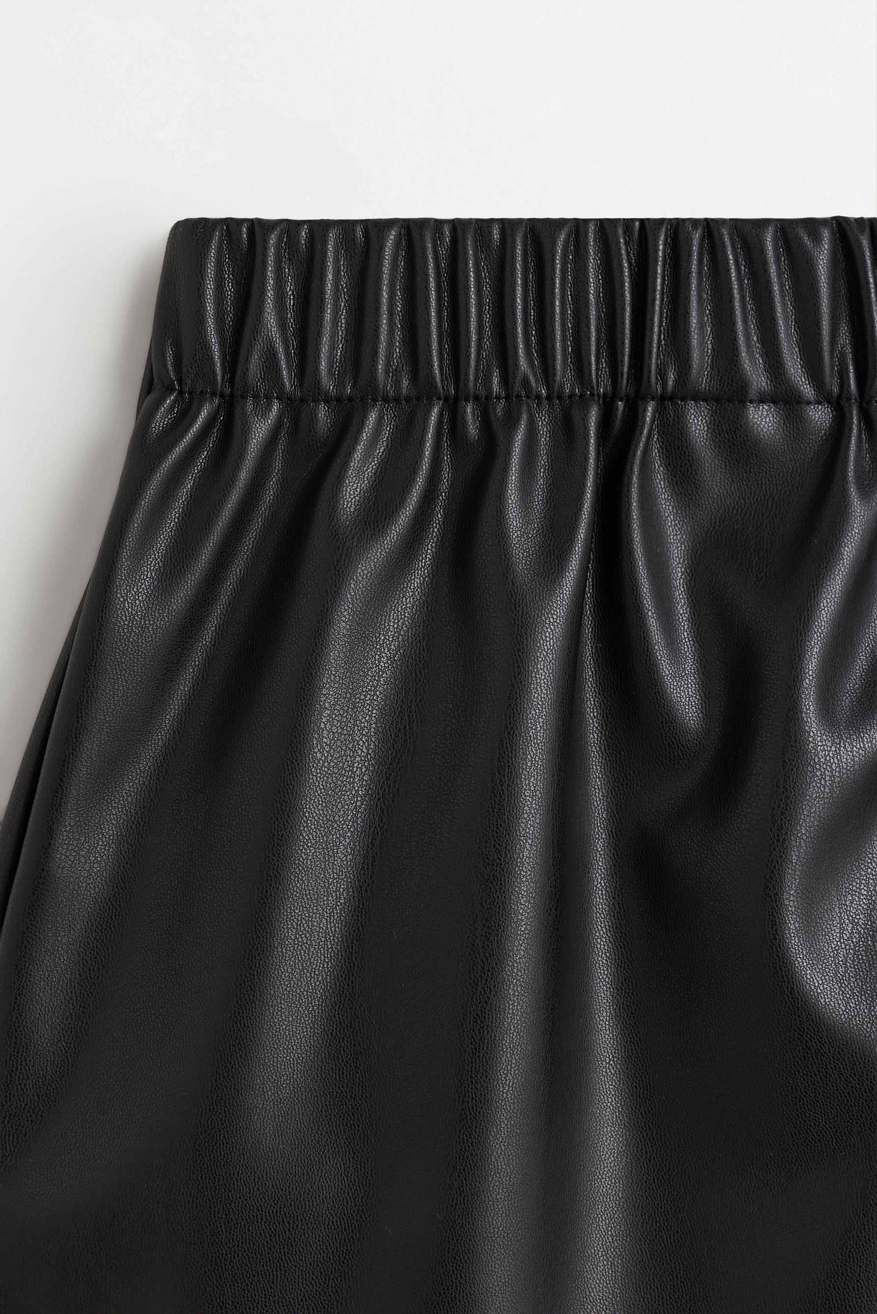 Leather effect skort with hearts — BLACK