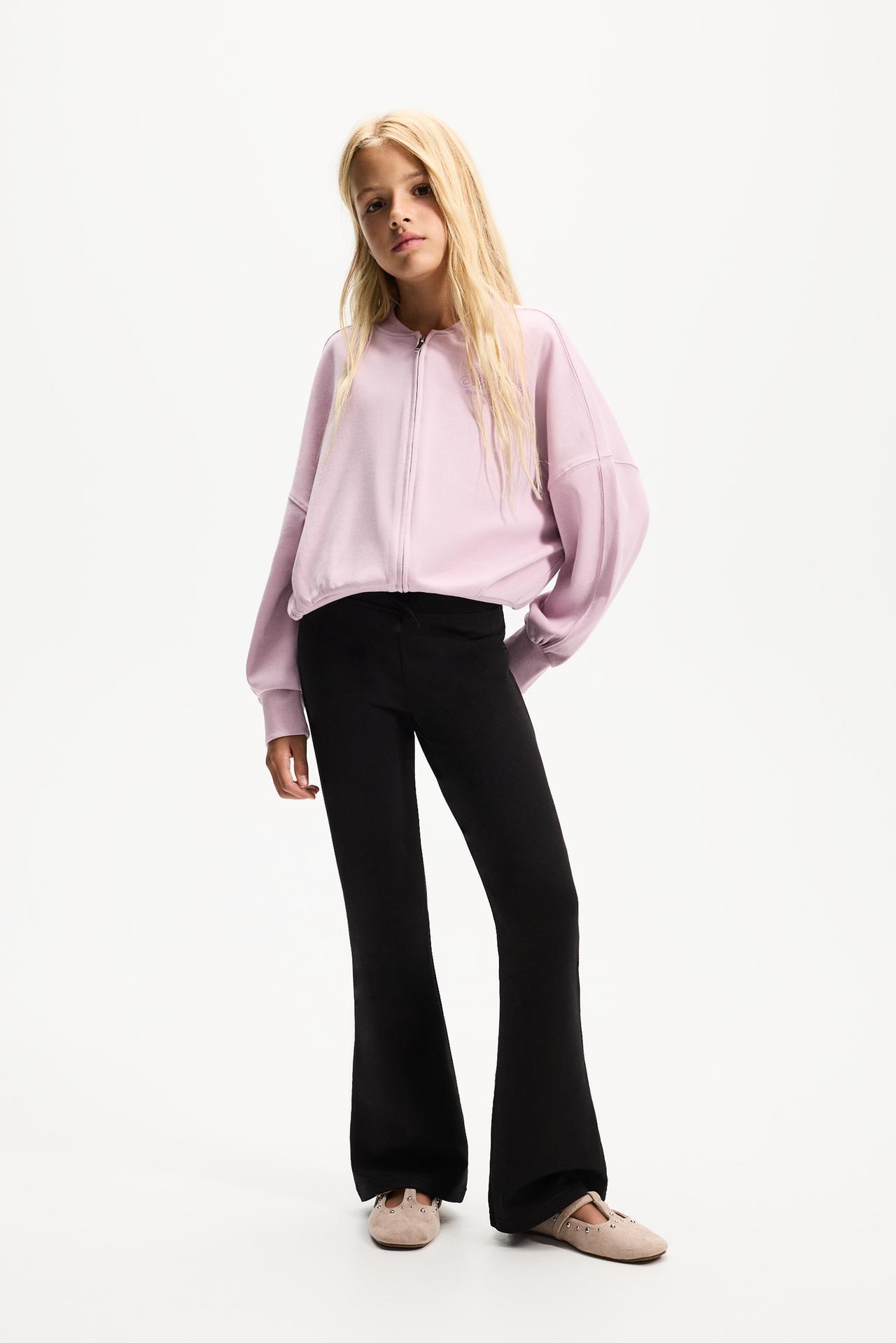Star print fleece bell bottom leggings — BLACK