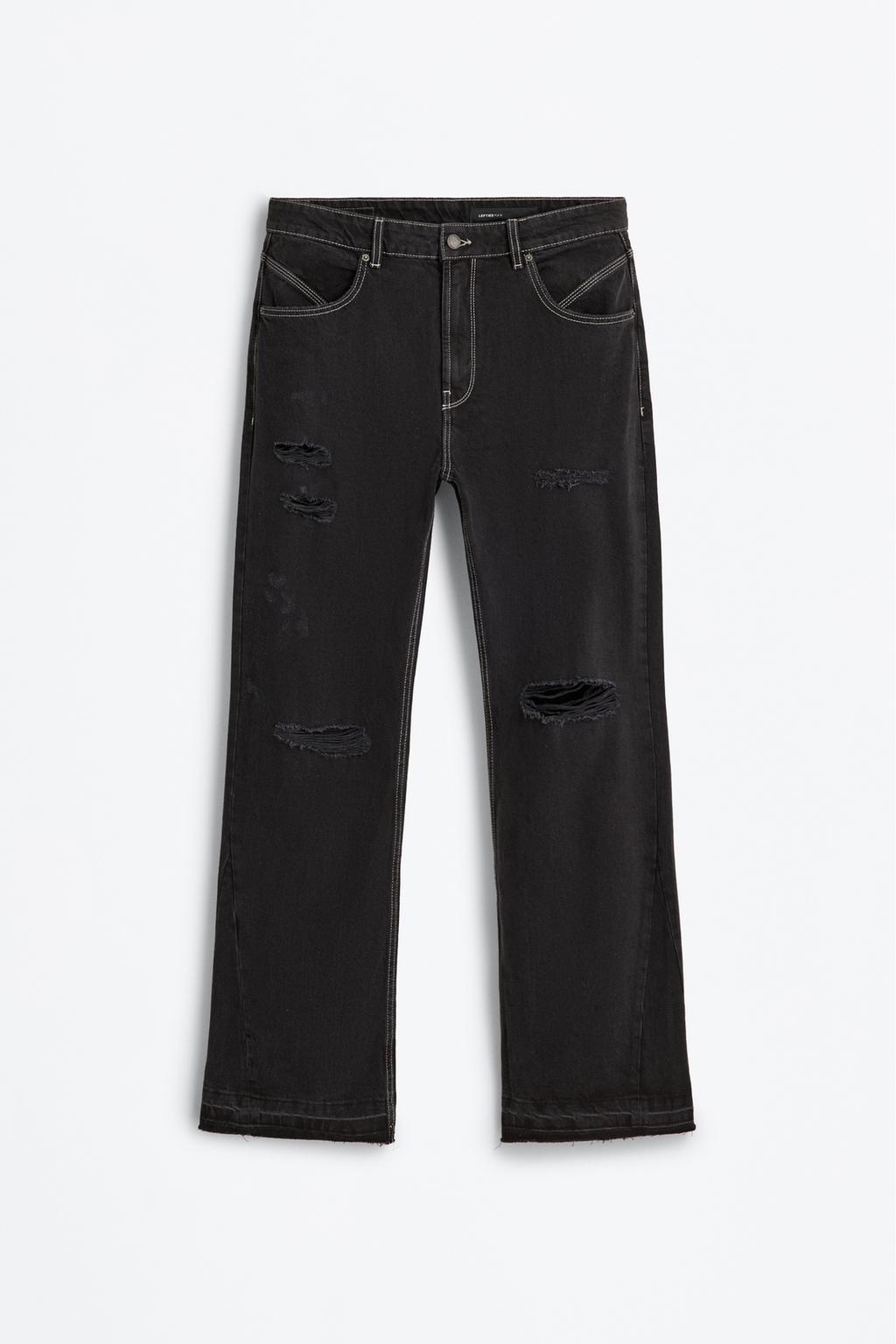 Jeans boca de sino rasgados