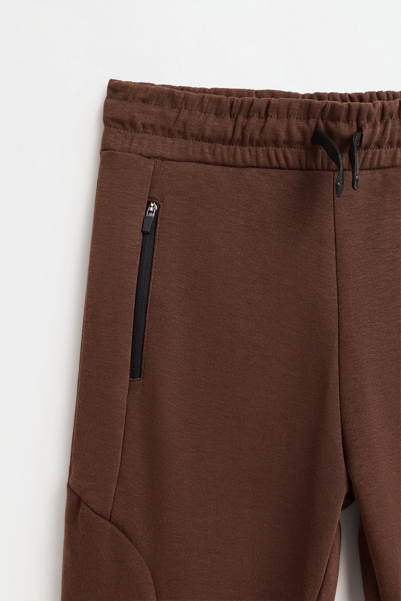 Interlock plush joggers — BROWN