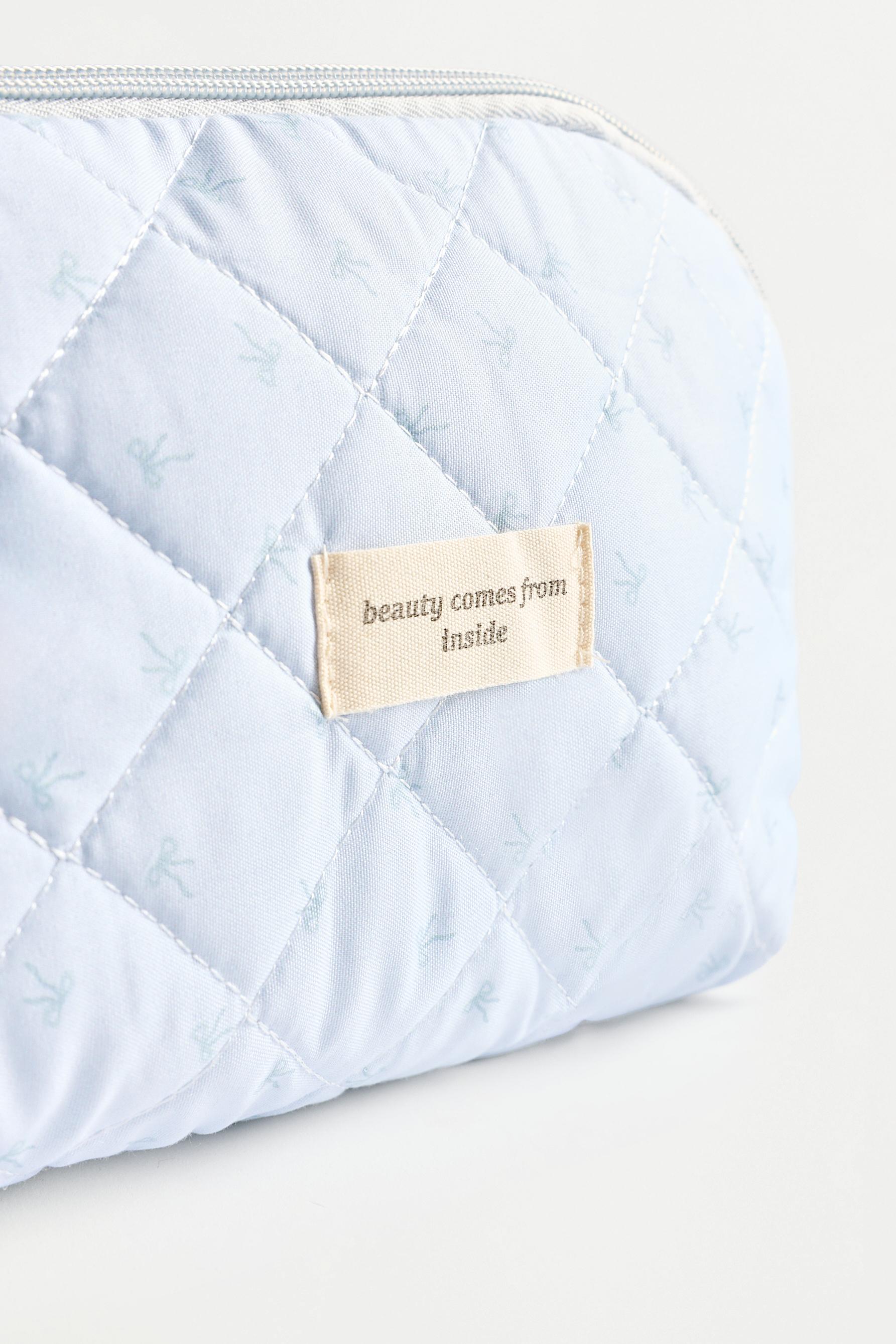 Medium ribbon-print toiletry bag — PASTEL BLUE