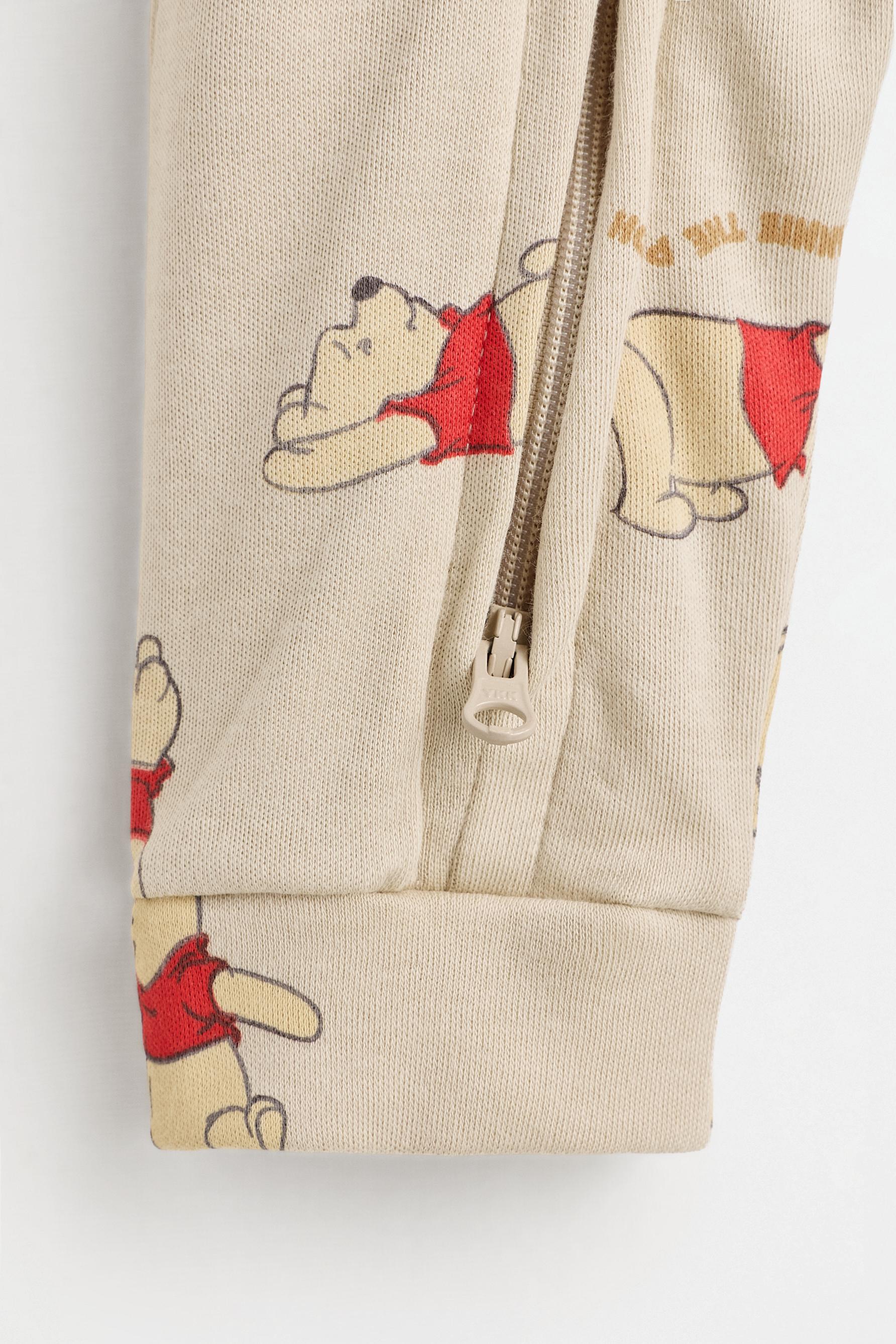 Winnie the Pooh ©Disney sleepsuit — BEIGE