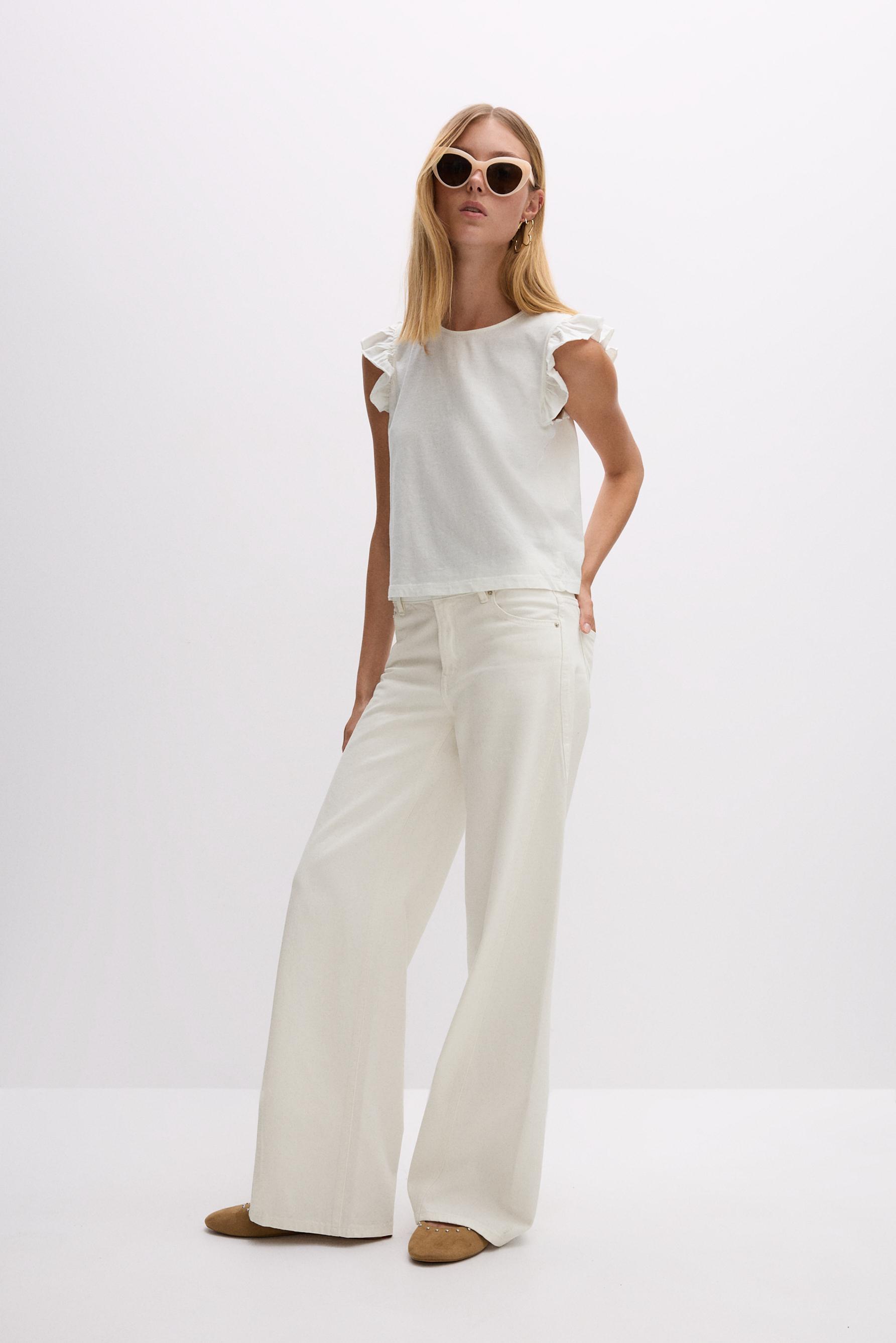 Jeans wide leg costuras giradas