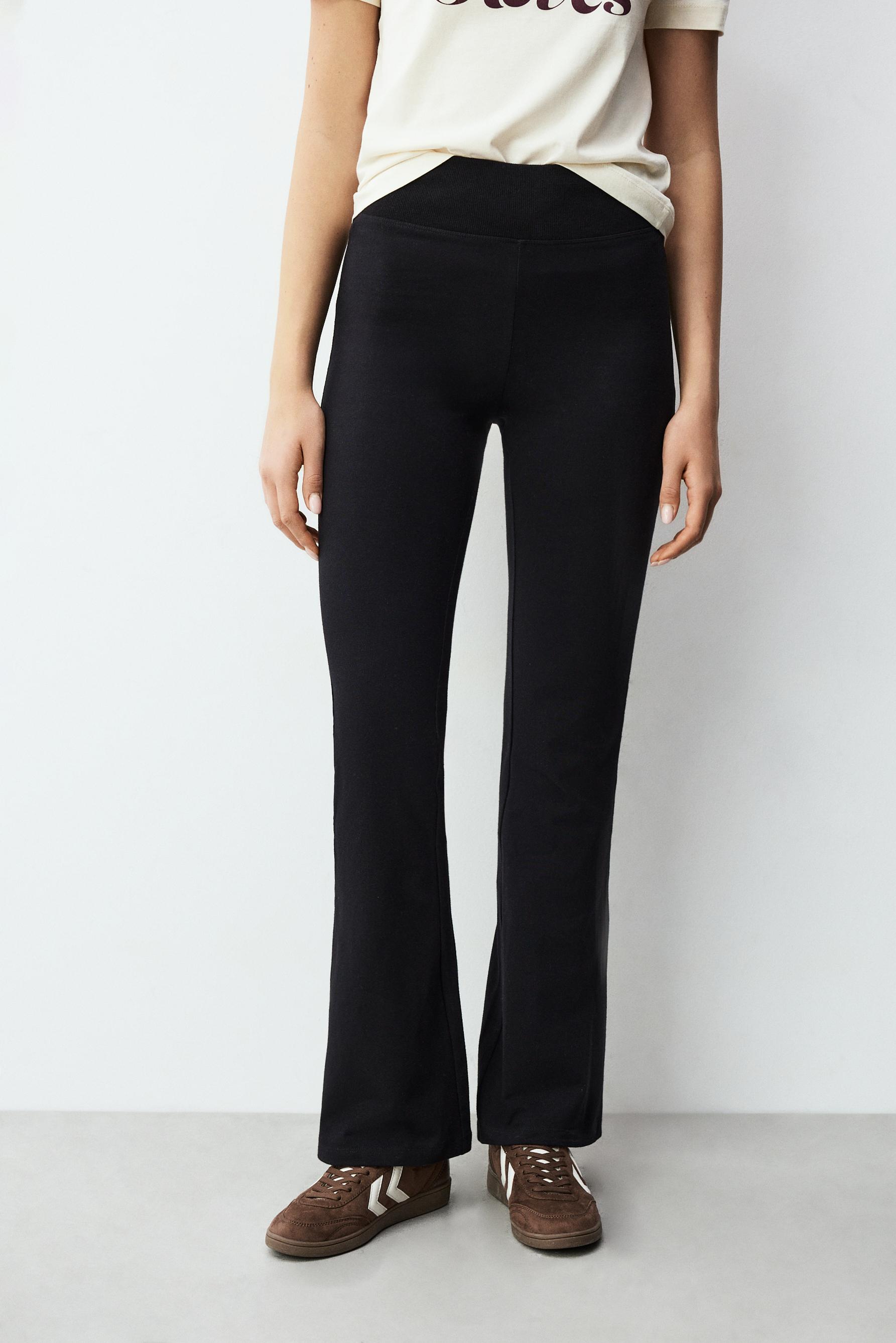 Bell bottom leggings with ribbed waist — BLACK