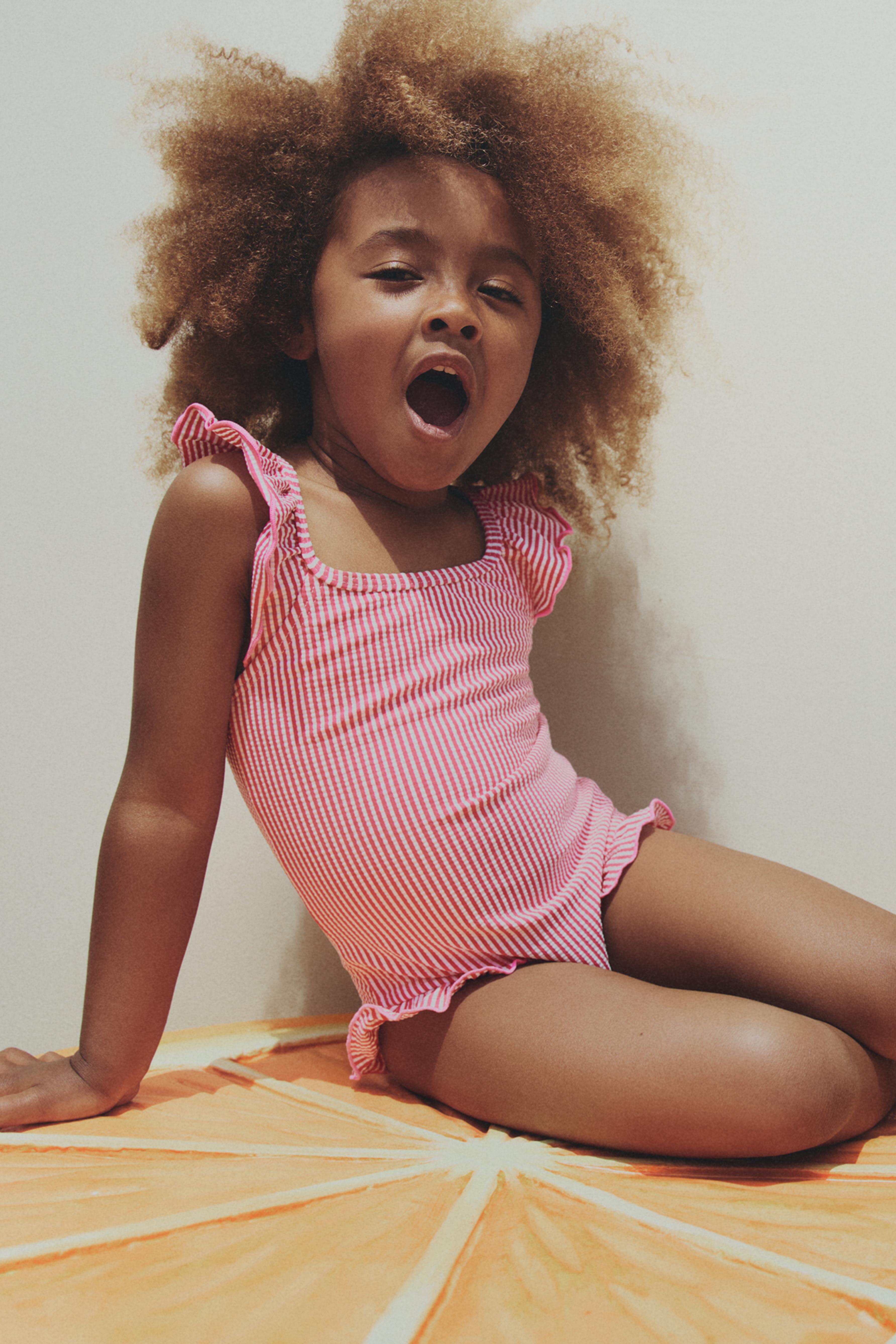 Striped ruffled swimsuit — FUCHSIA