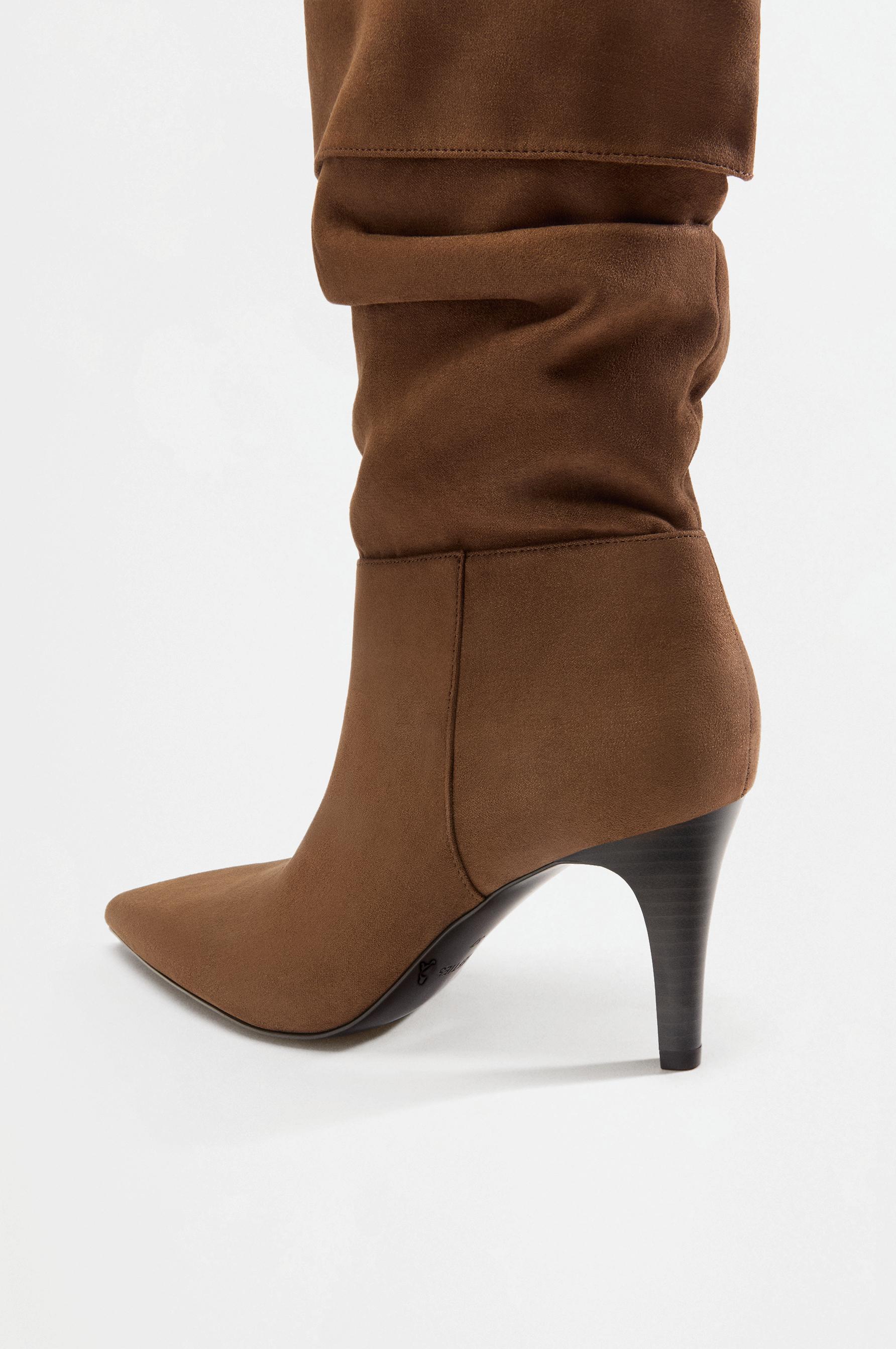Slouchy heeled boots — LEATHER