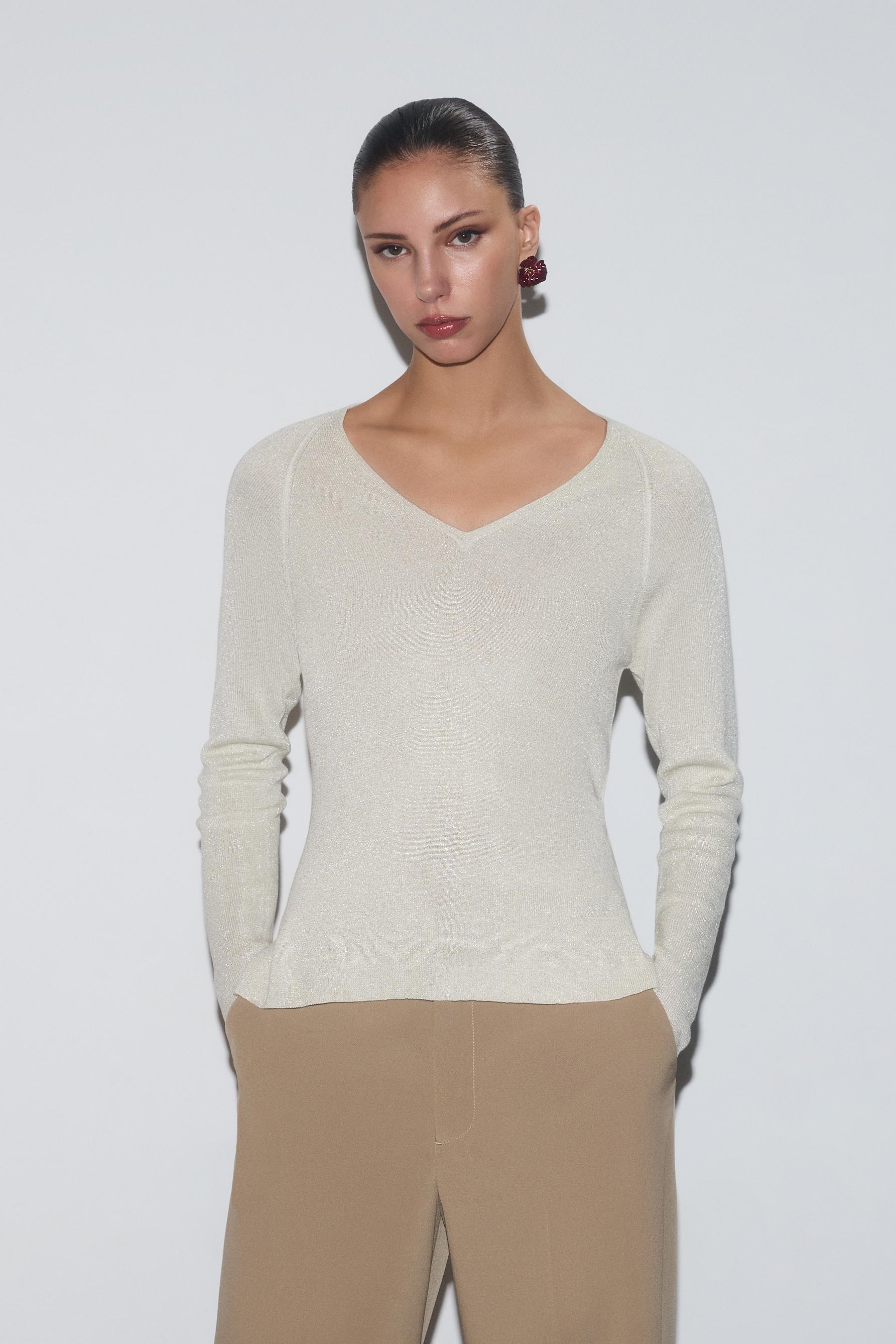 Jersey cuello pico brillo