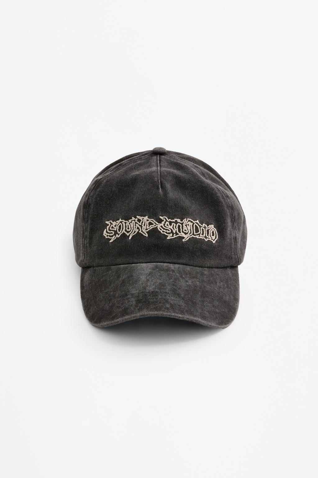 Faded-effect embroidered cap