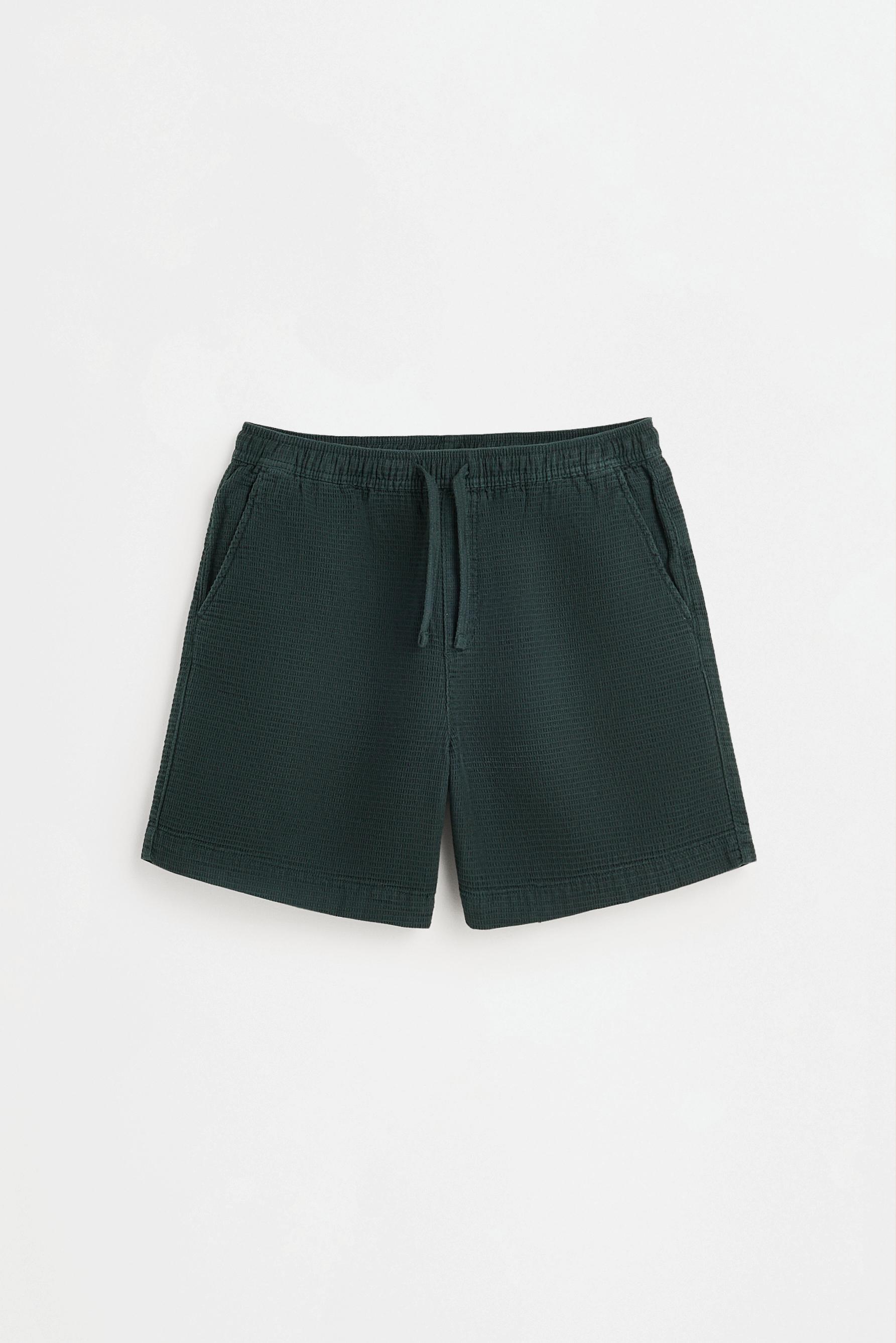 Textured waffle-knit Bermuda shorts — GREEN