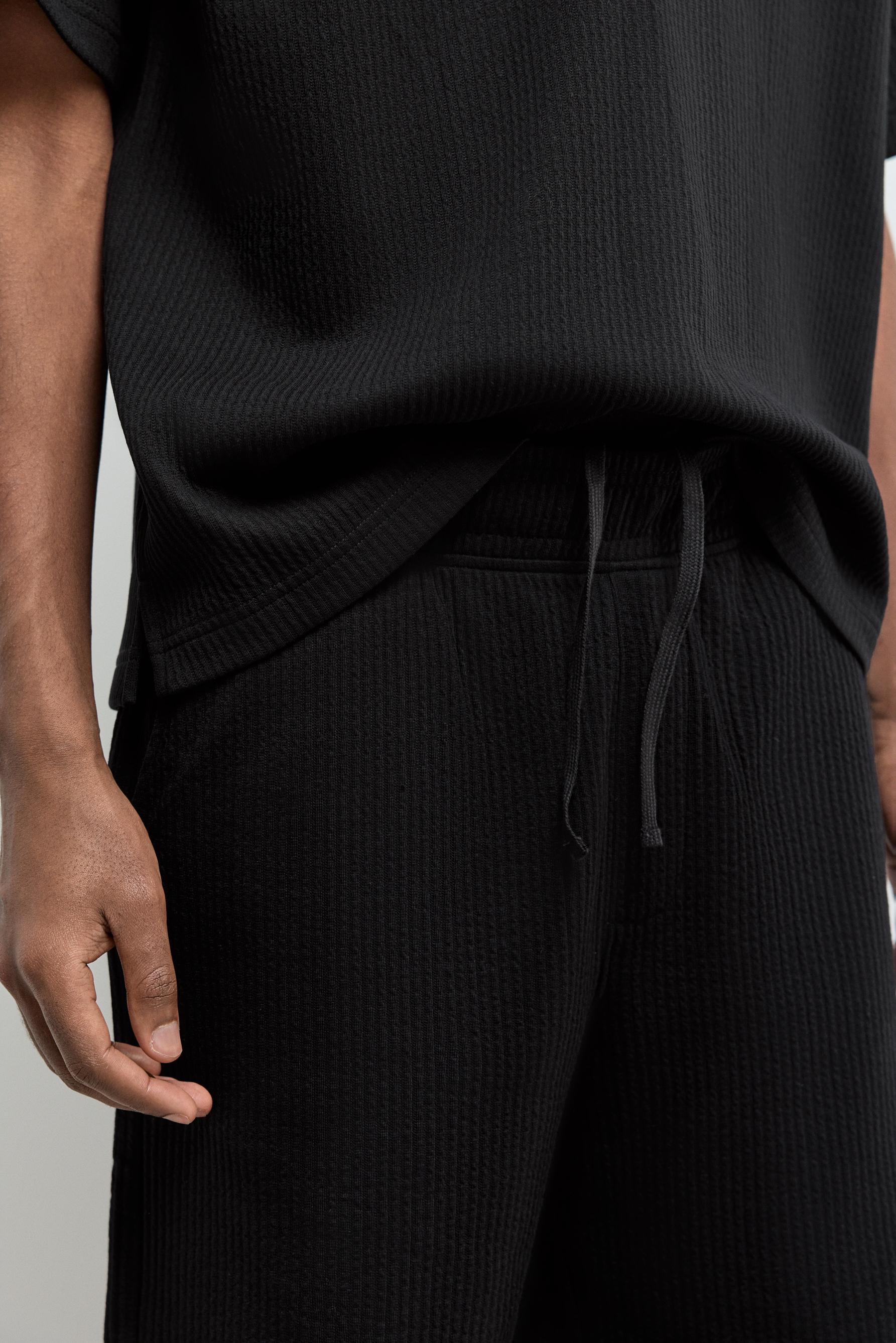 Textured tracksuit Bermuda shorts — BLACK