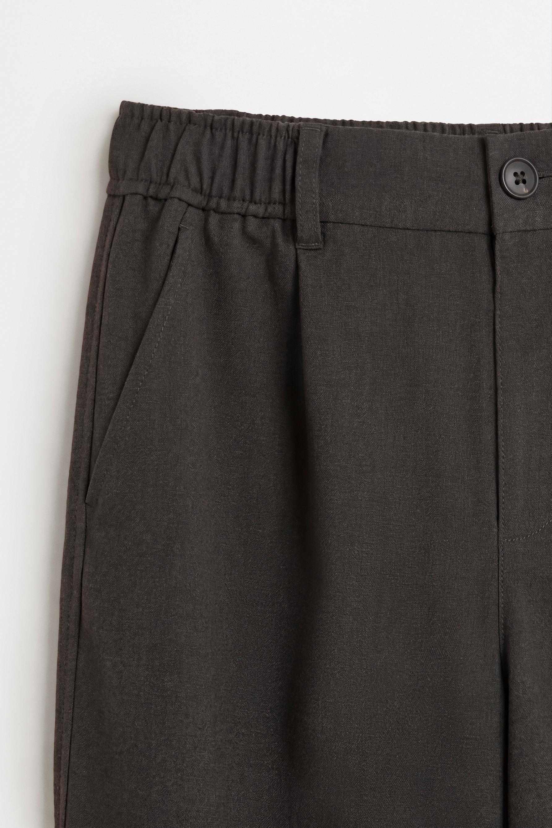 Tailored fit pleated trousers — LEAD