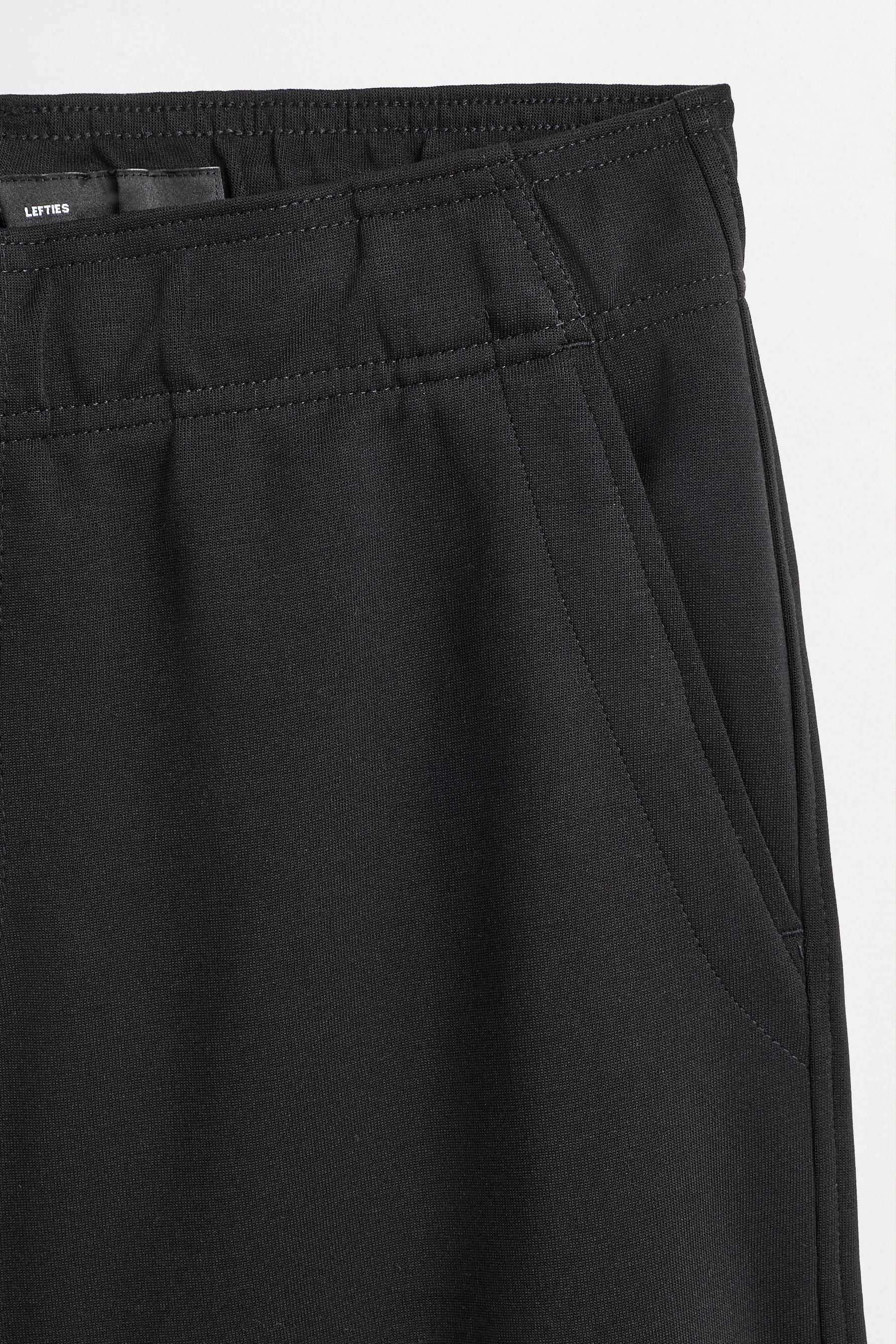 Interlock baggy joggers — BLACK