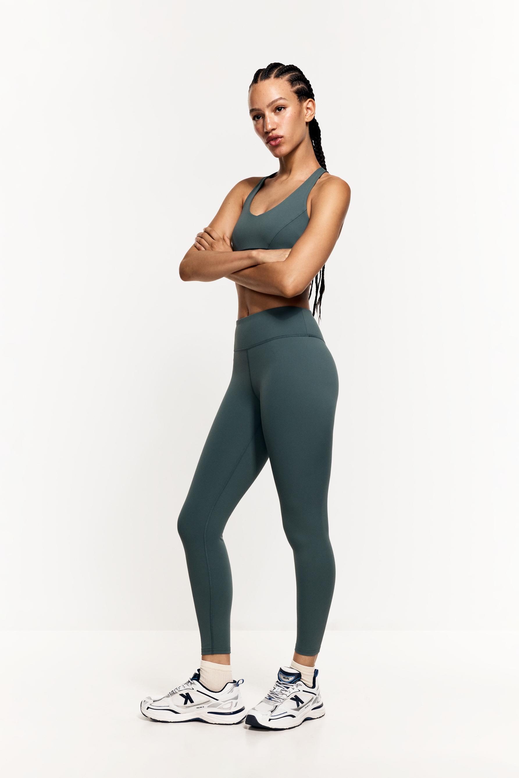 Criss-cross strap sports top — EMERALD GREEN
